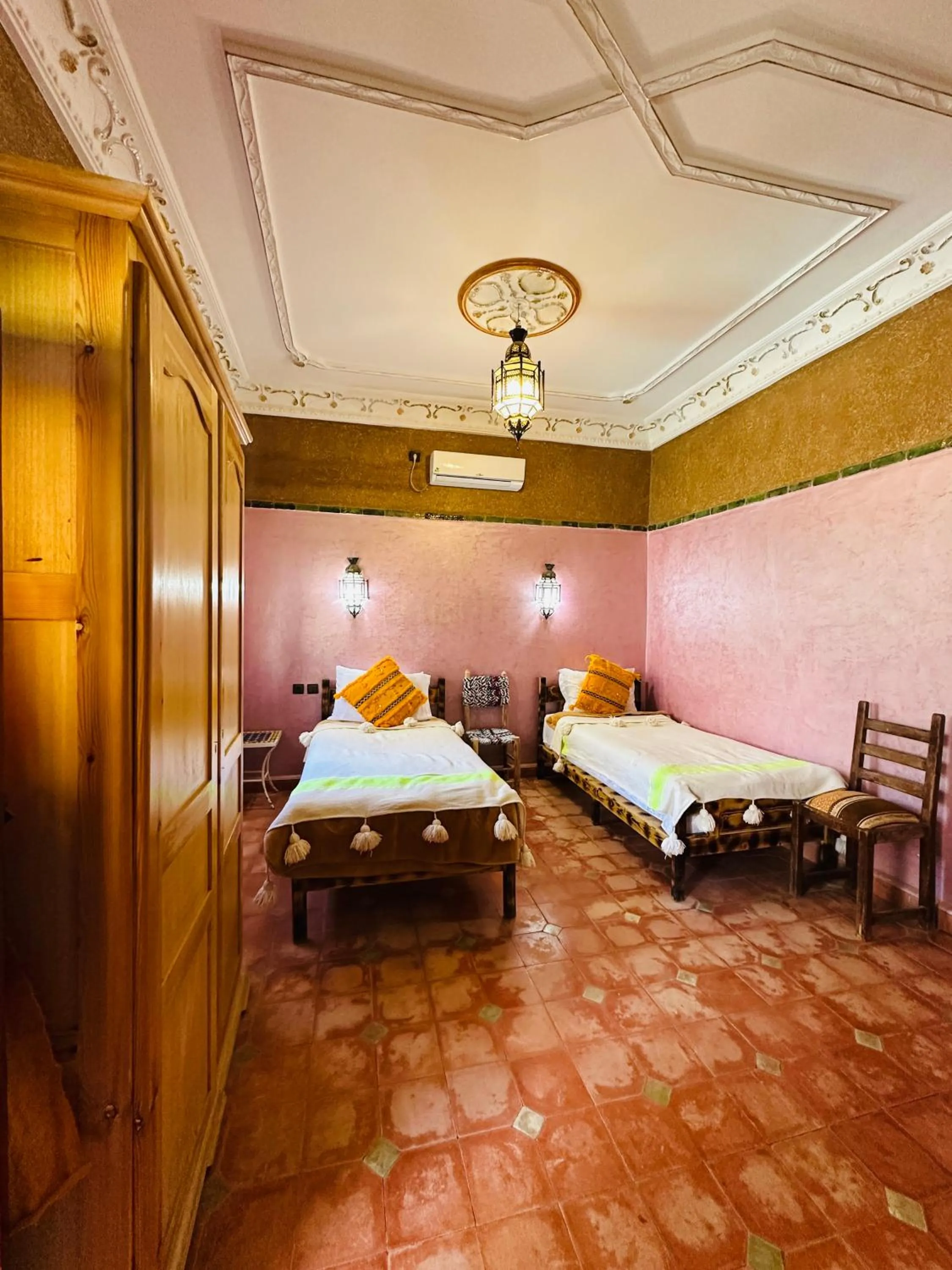 Bed in Riad Soleil du Monde