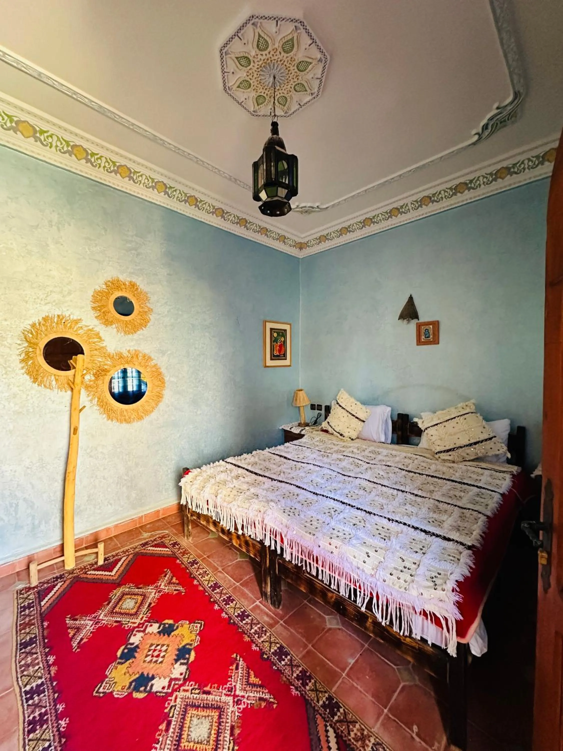 Bed in Riad Soleil du Monde