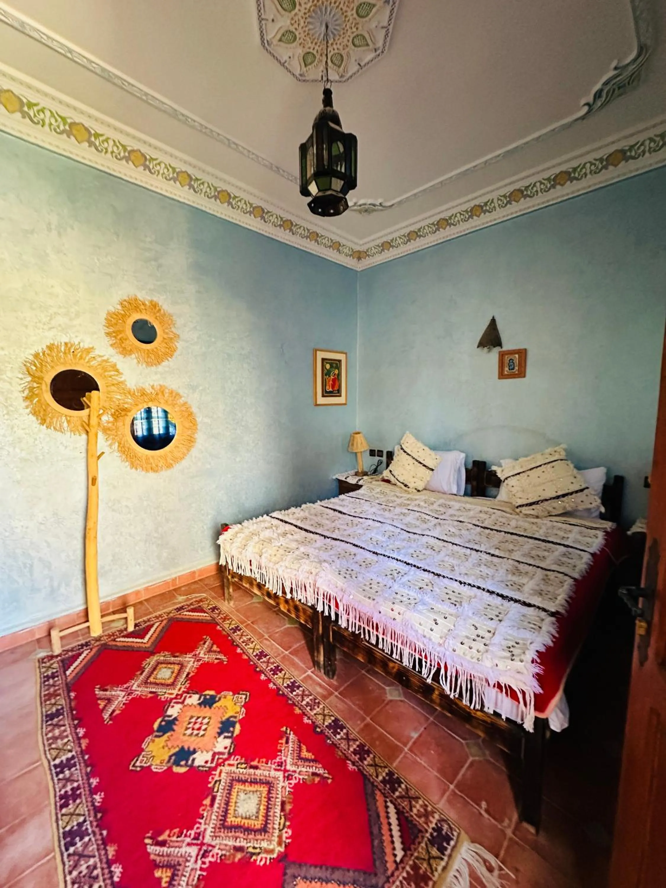 Bed in Riad Soleil du Monde