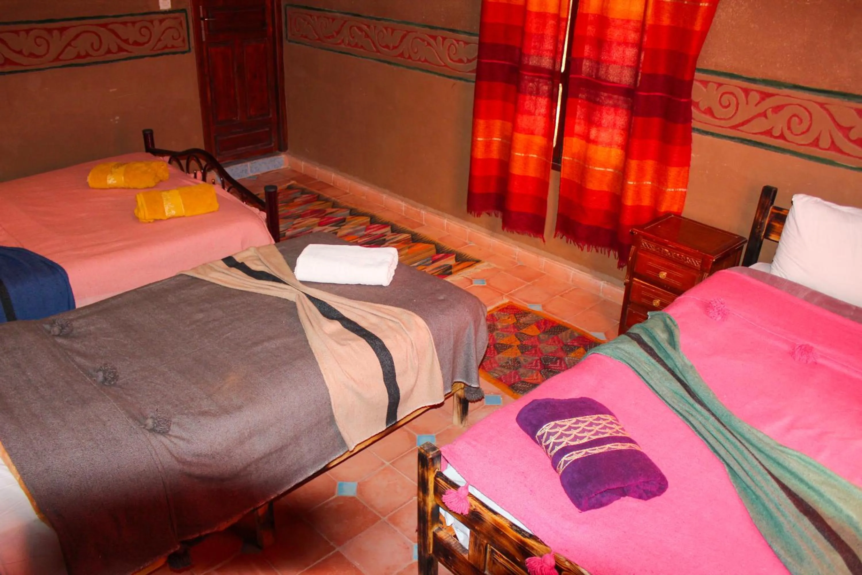 Bed in Riad Soleil du Monde