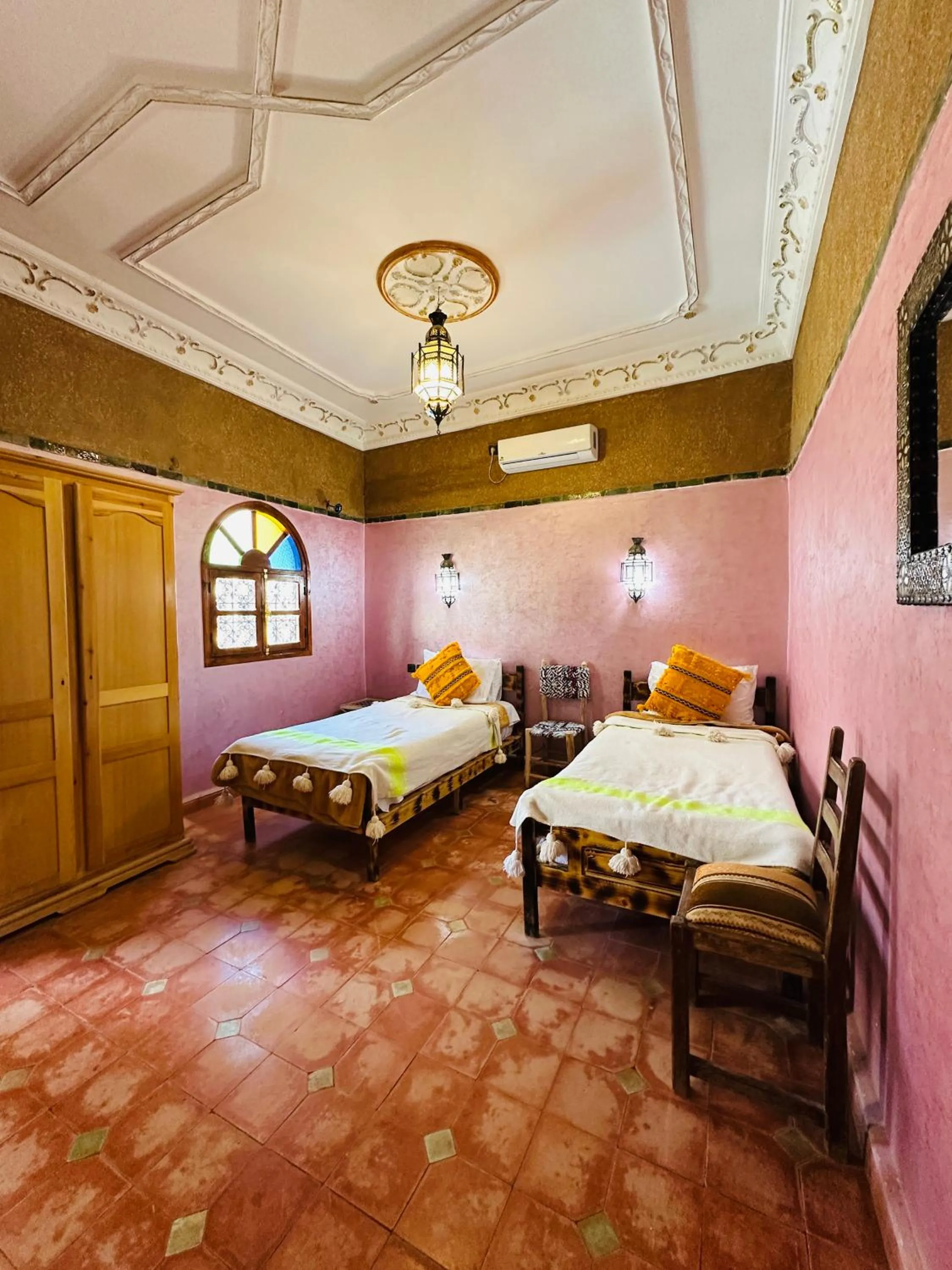 Bed in Riad Soleil du Monde