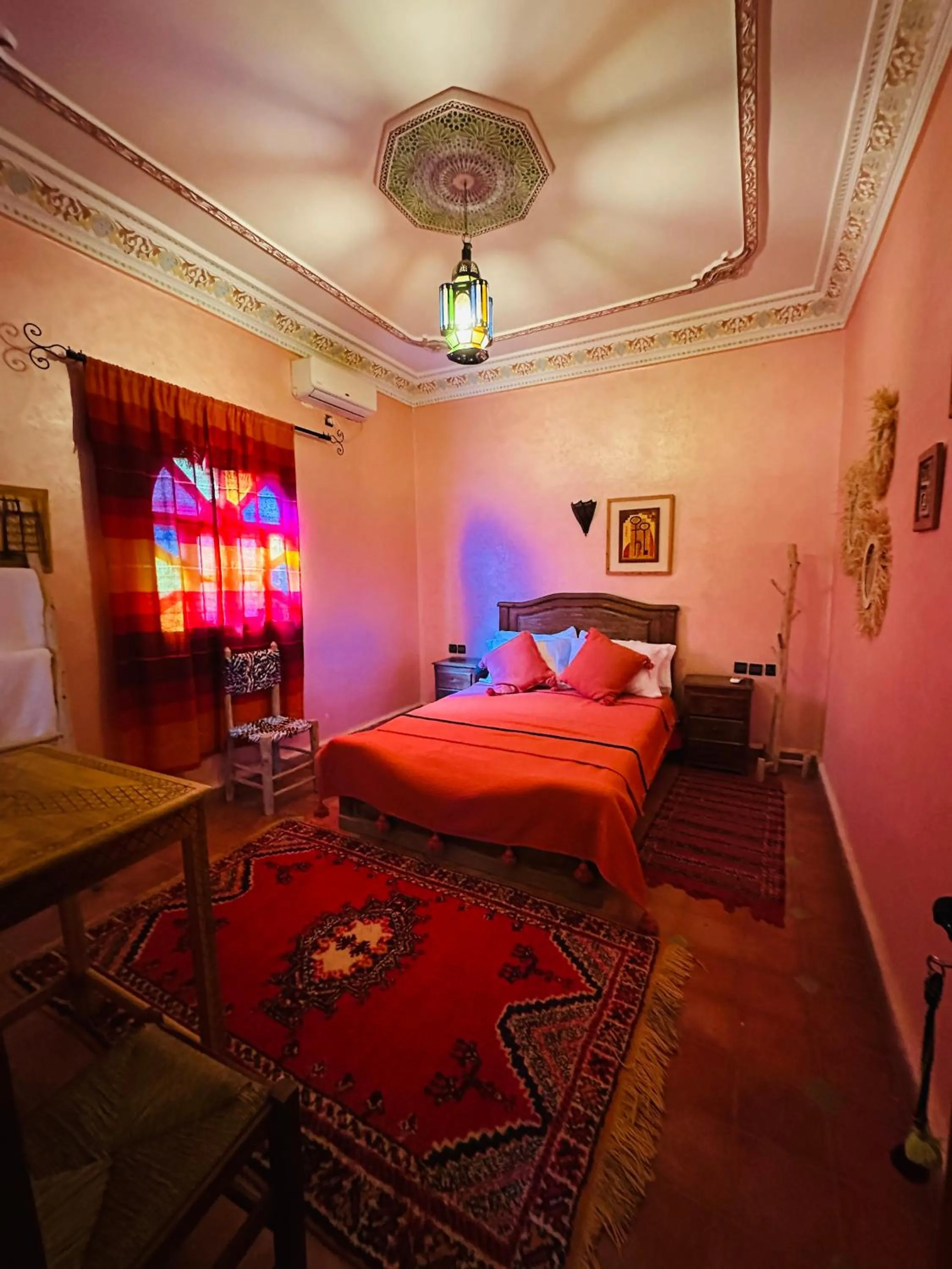 Bed in Riad Soleil du Monde