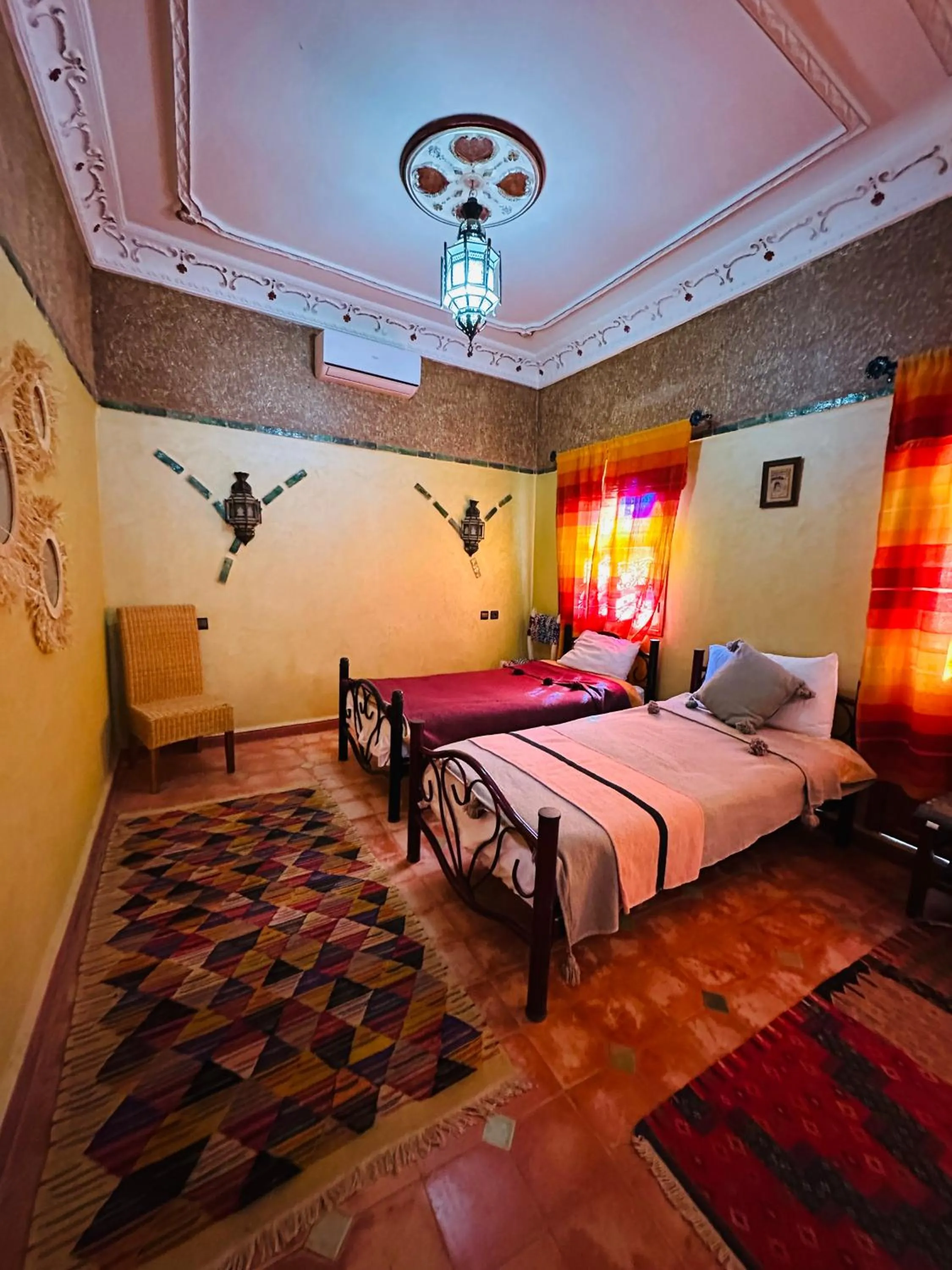 Bed in Riad Soleil du Monde