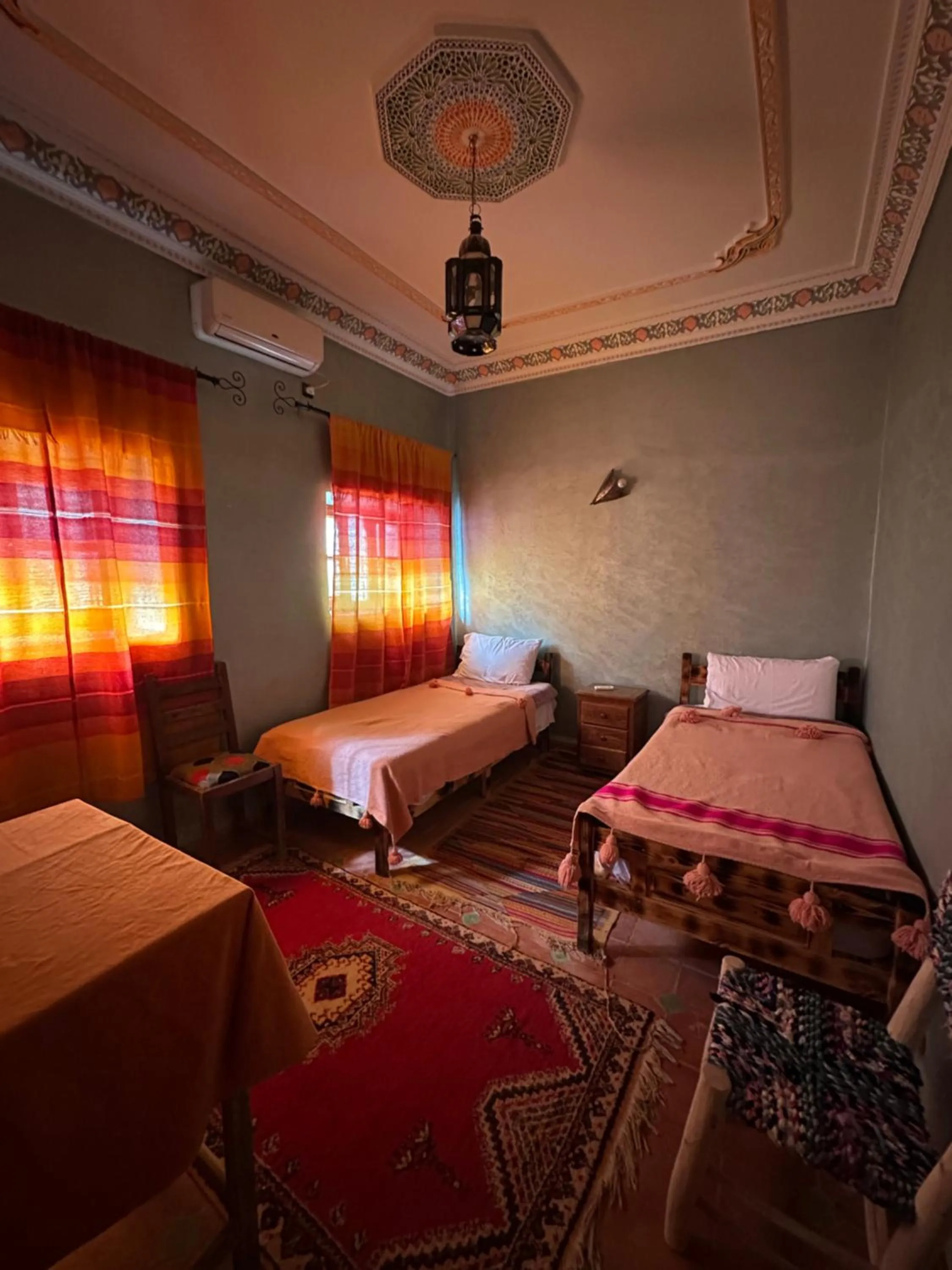 Bed in Riad Soleil du Monde