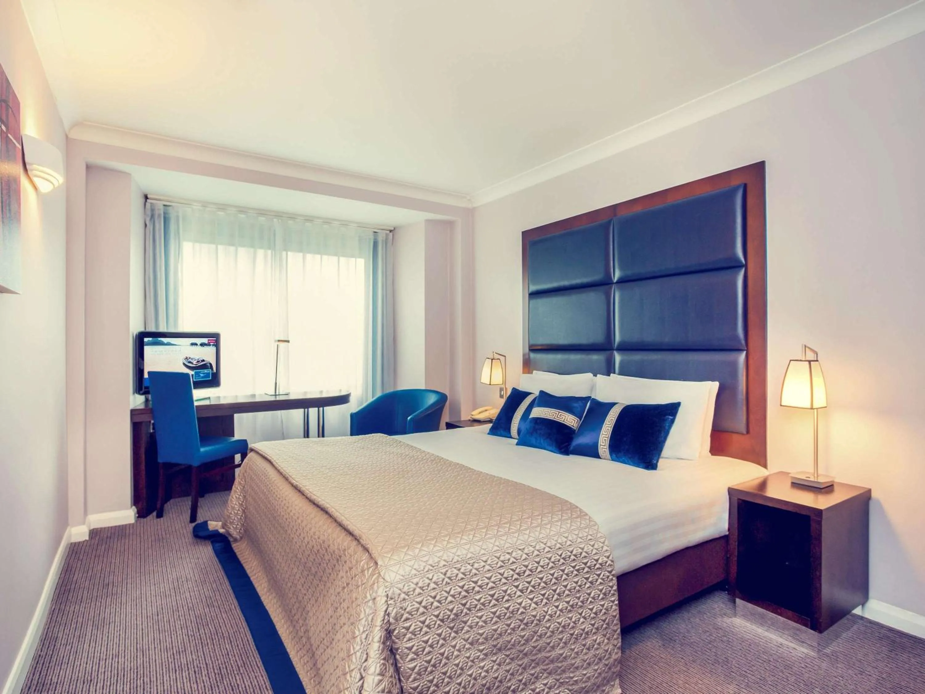 Photo of the whole room in Mercure London Kensington Hotel