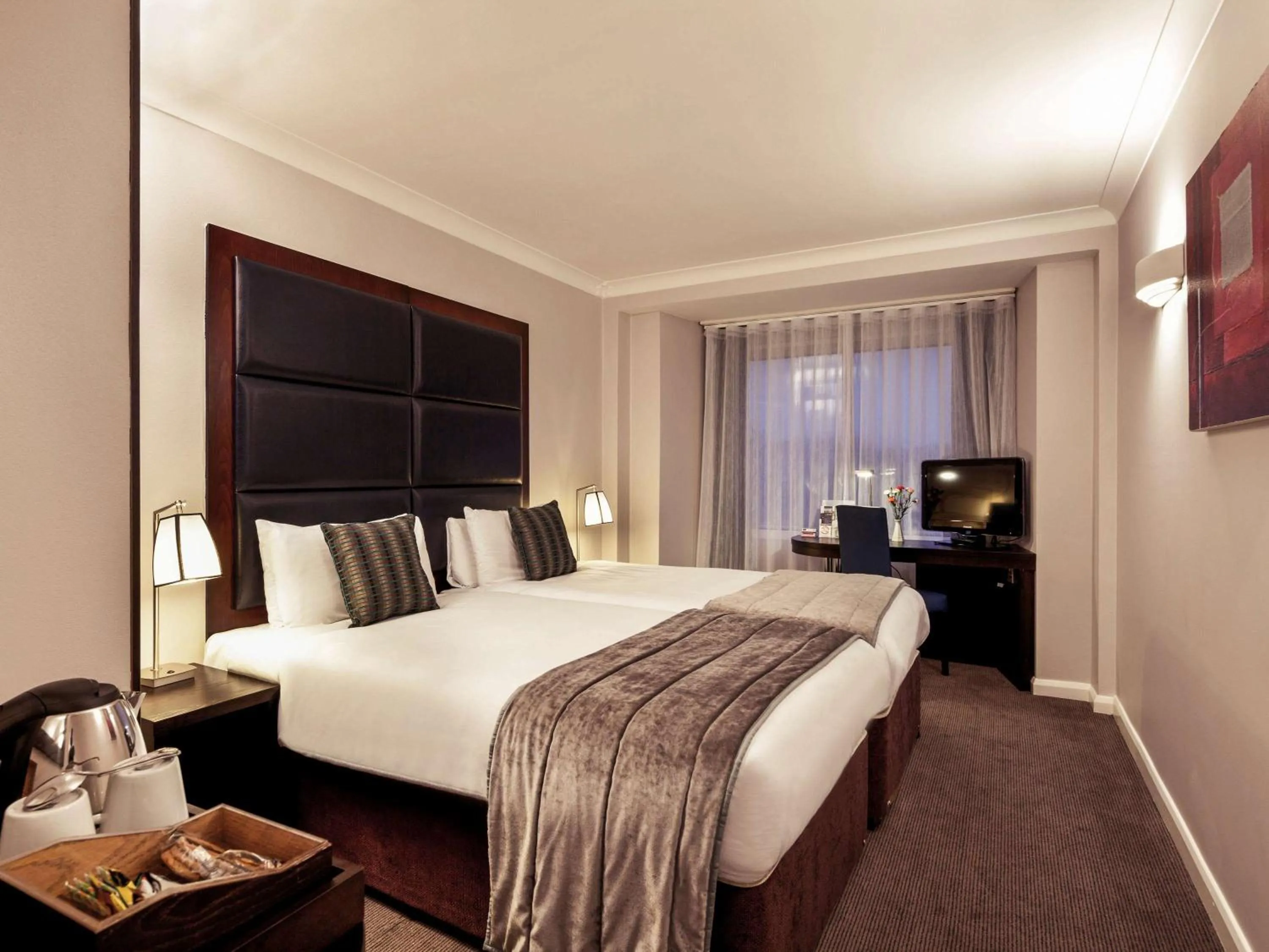 Photo of the whole room in Mercure London Kensington Hotel