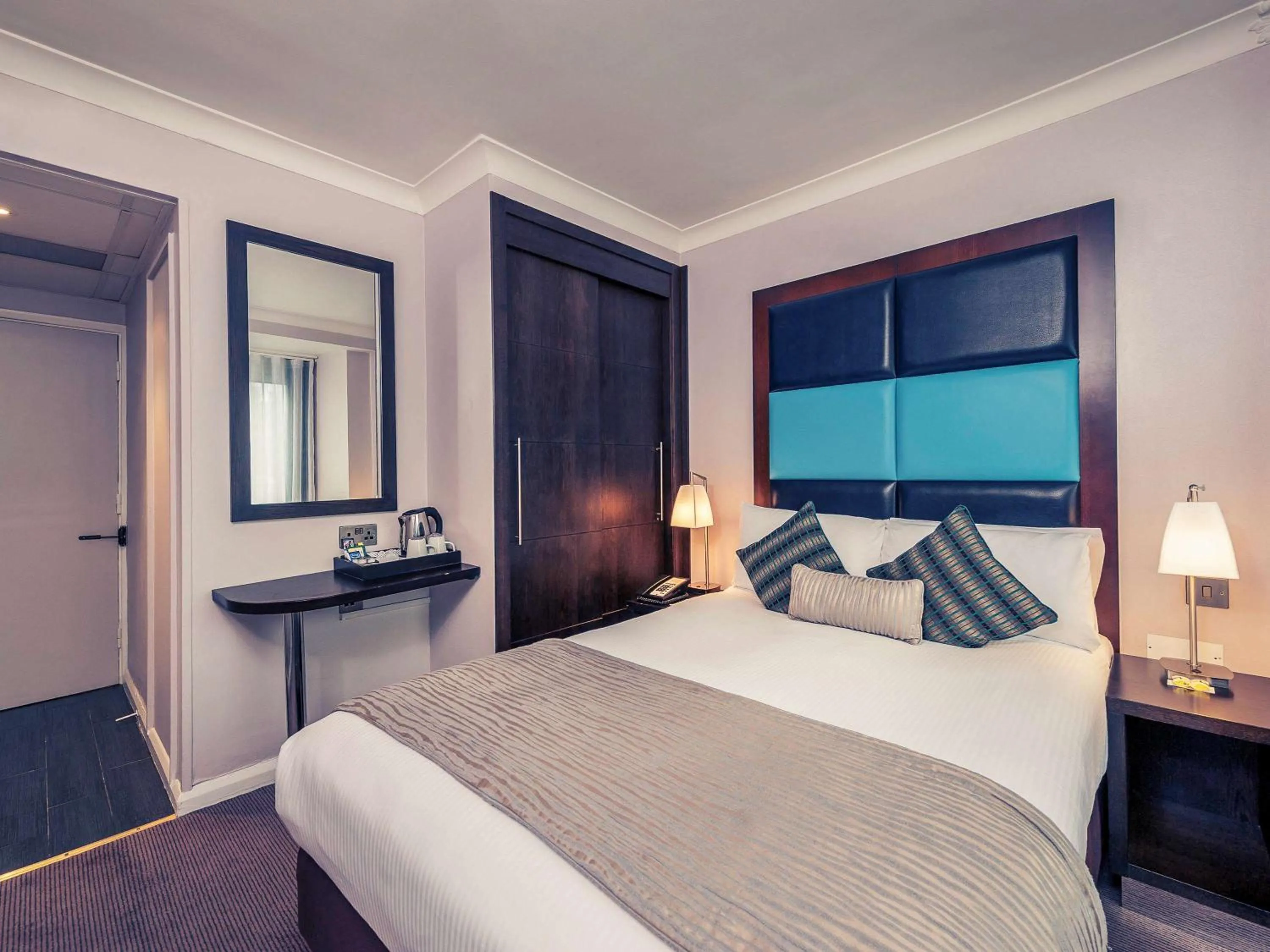 Photo of the whole room in Mercure London Kensington Hotel