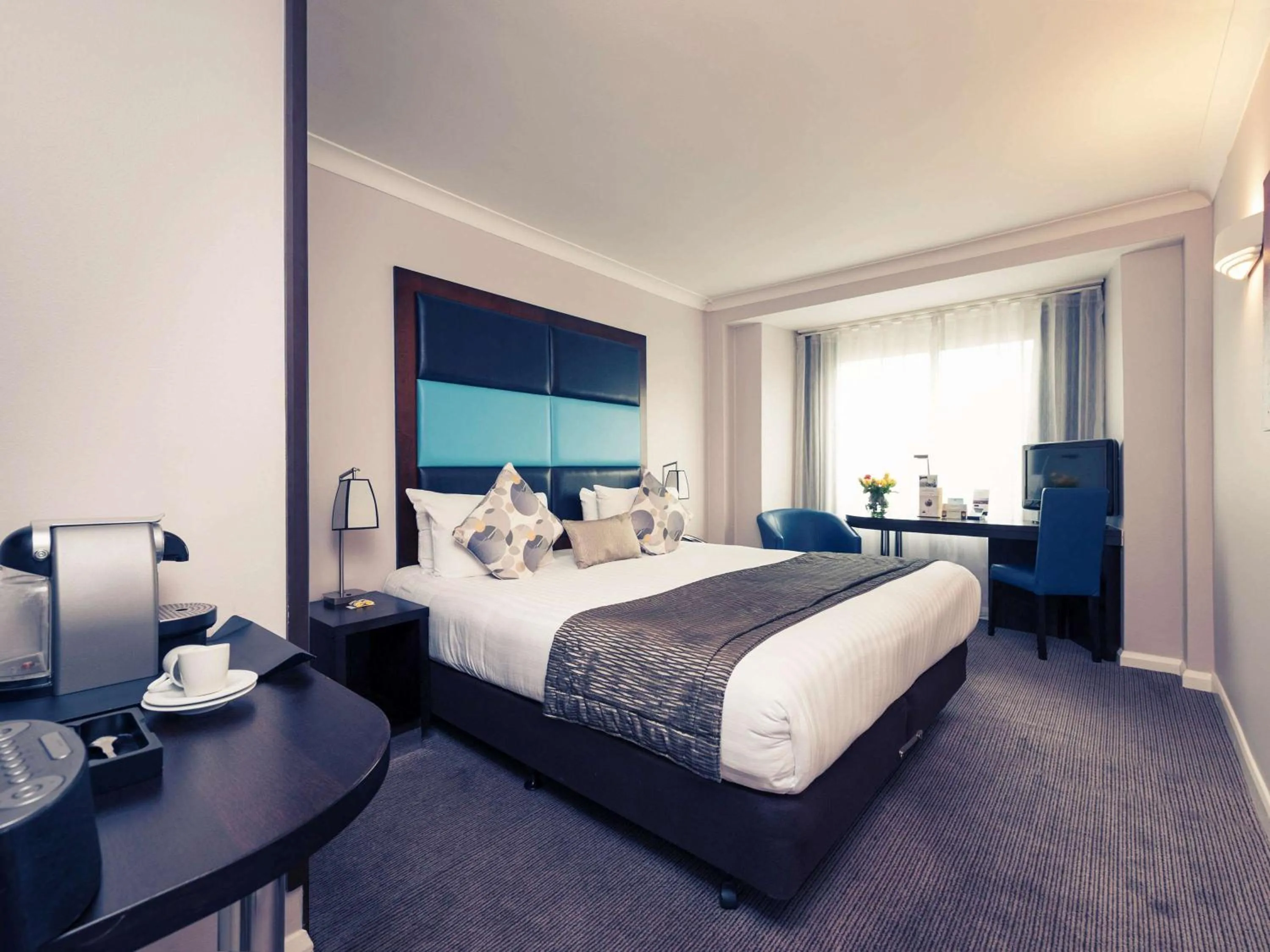 Photo of the whole room in Mercure London Kensington Hotel