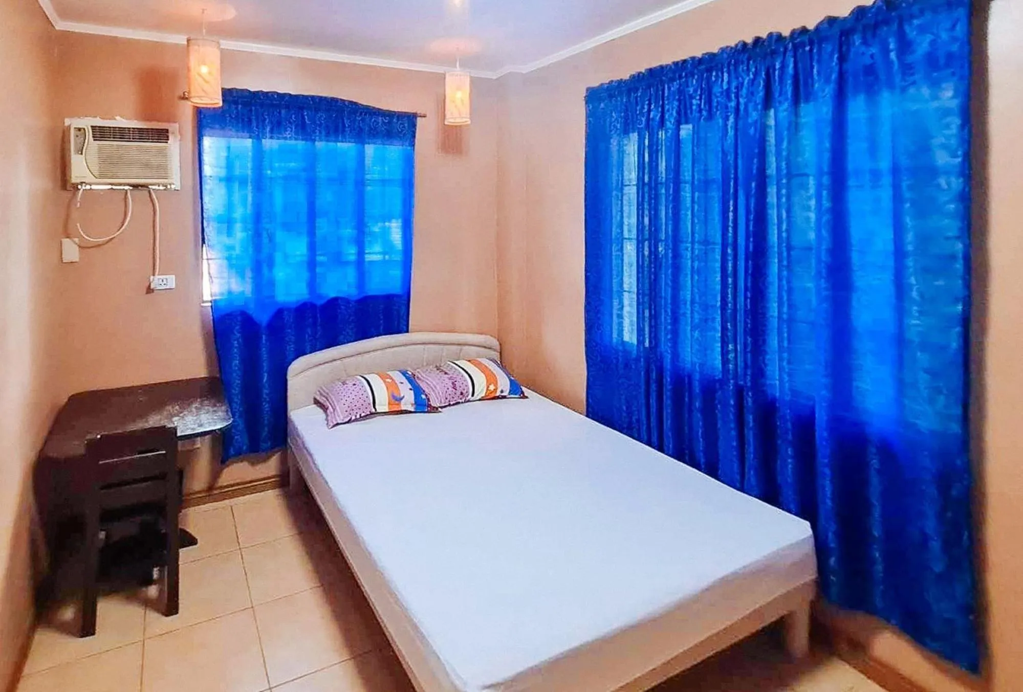 Photo of the whole room, Bed in RedDoorz @ D'Little Egg Hostel Pangasinan