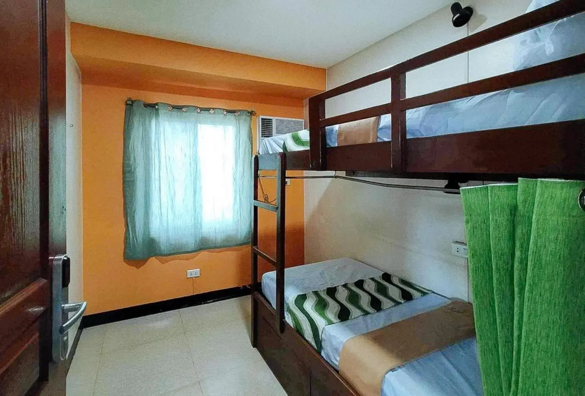 Family Room with Shared Bathroom in RedDoorz @ Recson Hostel Coron Palawan Family Room with Shared Bathroom in RedDoorz @ Recson Hostel Coron Palawan