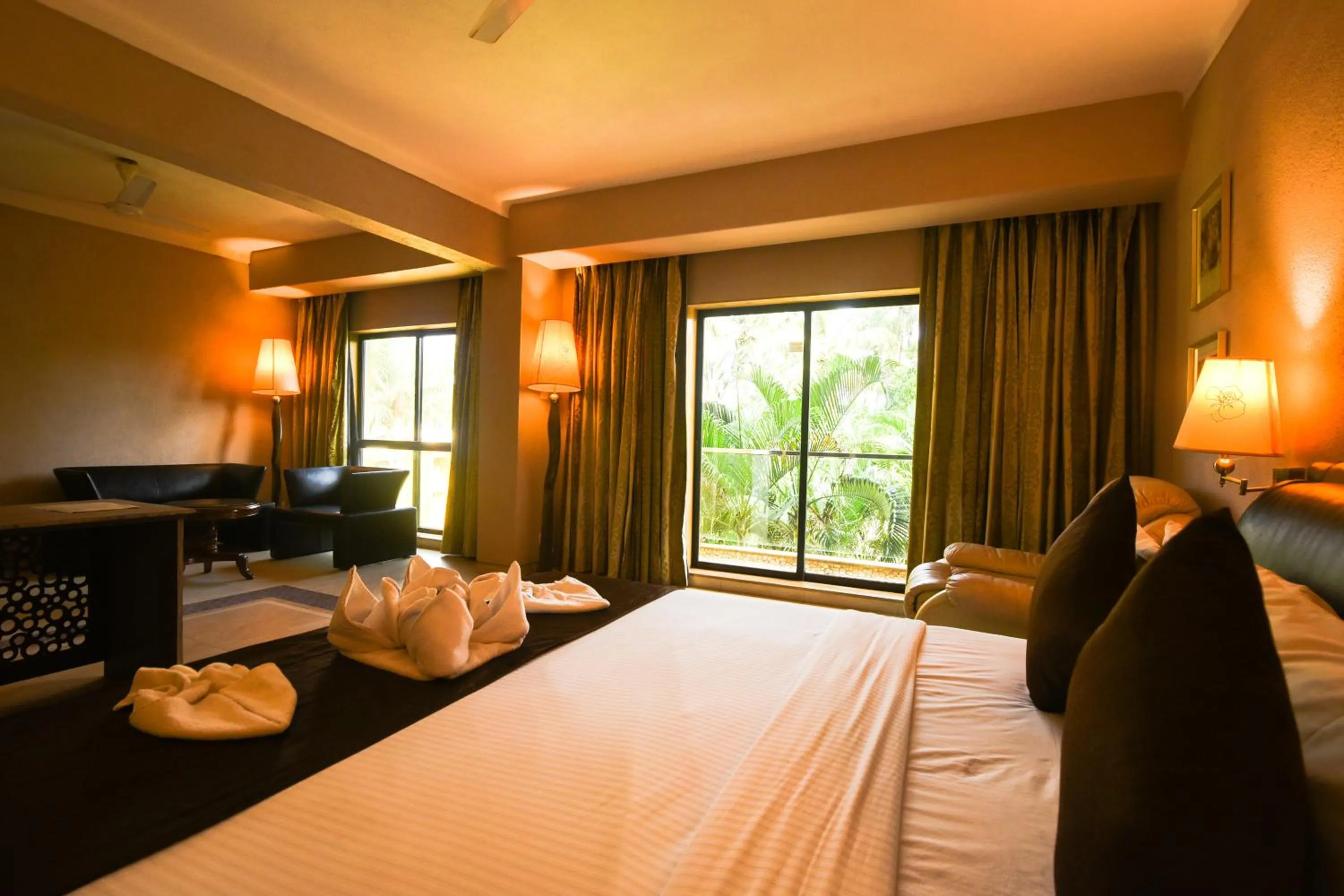 Photo of the whole room, Bed in Neelam the Glitz