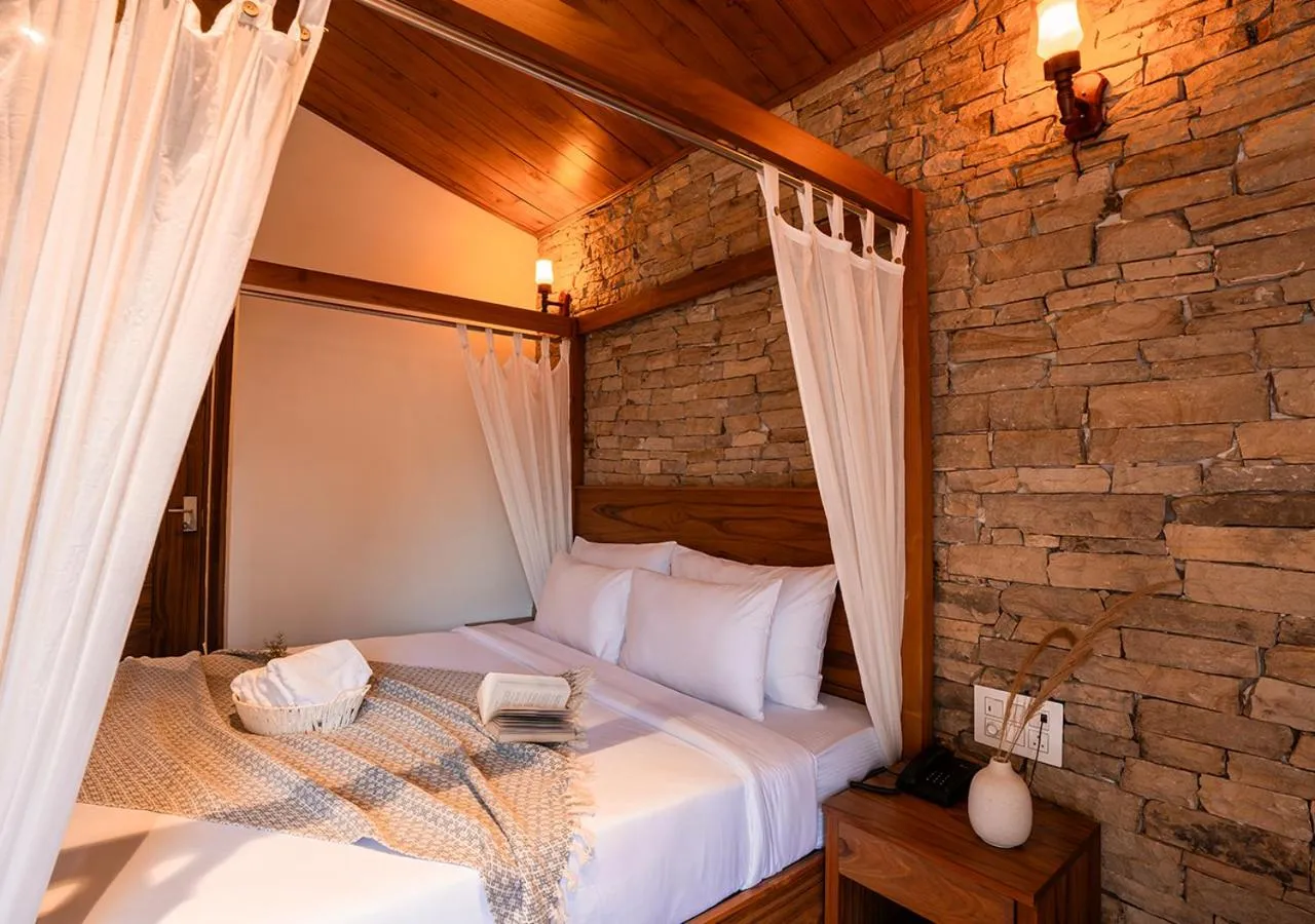 Bed in Moustache Bhimtal Luxuria, Nainital