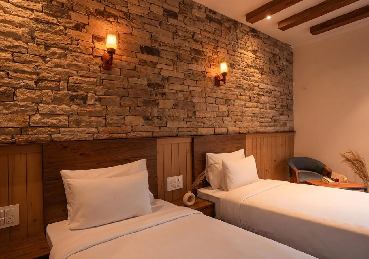 Bed in Moustache Bhimtal Luxuria, Nainital