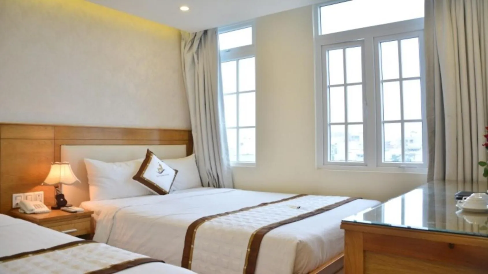 Bed in Sea Castle Hotel