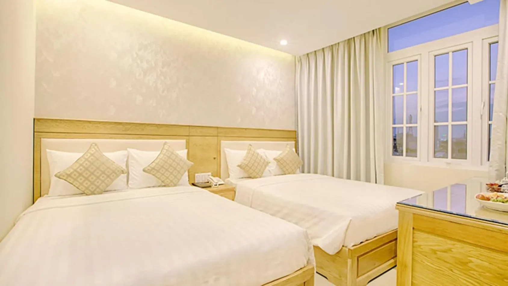 Bed in Sea Castle Hotel