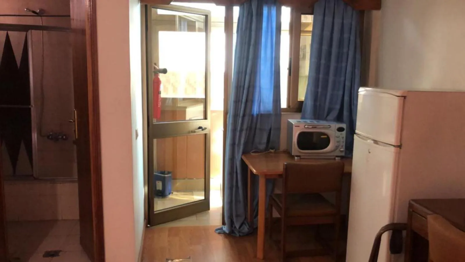 TV and multimedia in Emmad Furnished Hotel