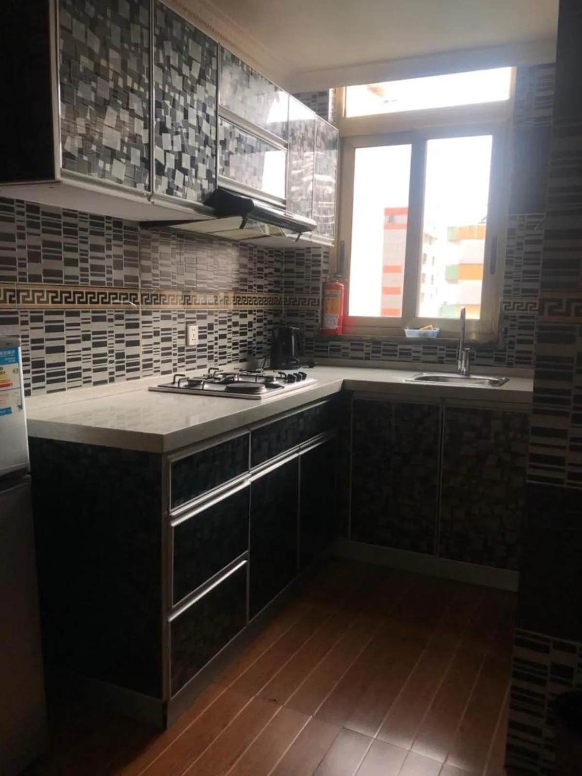 Kitchen or kitchenette in Emmad Furnished Hotel