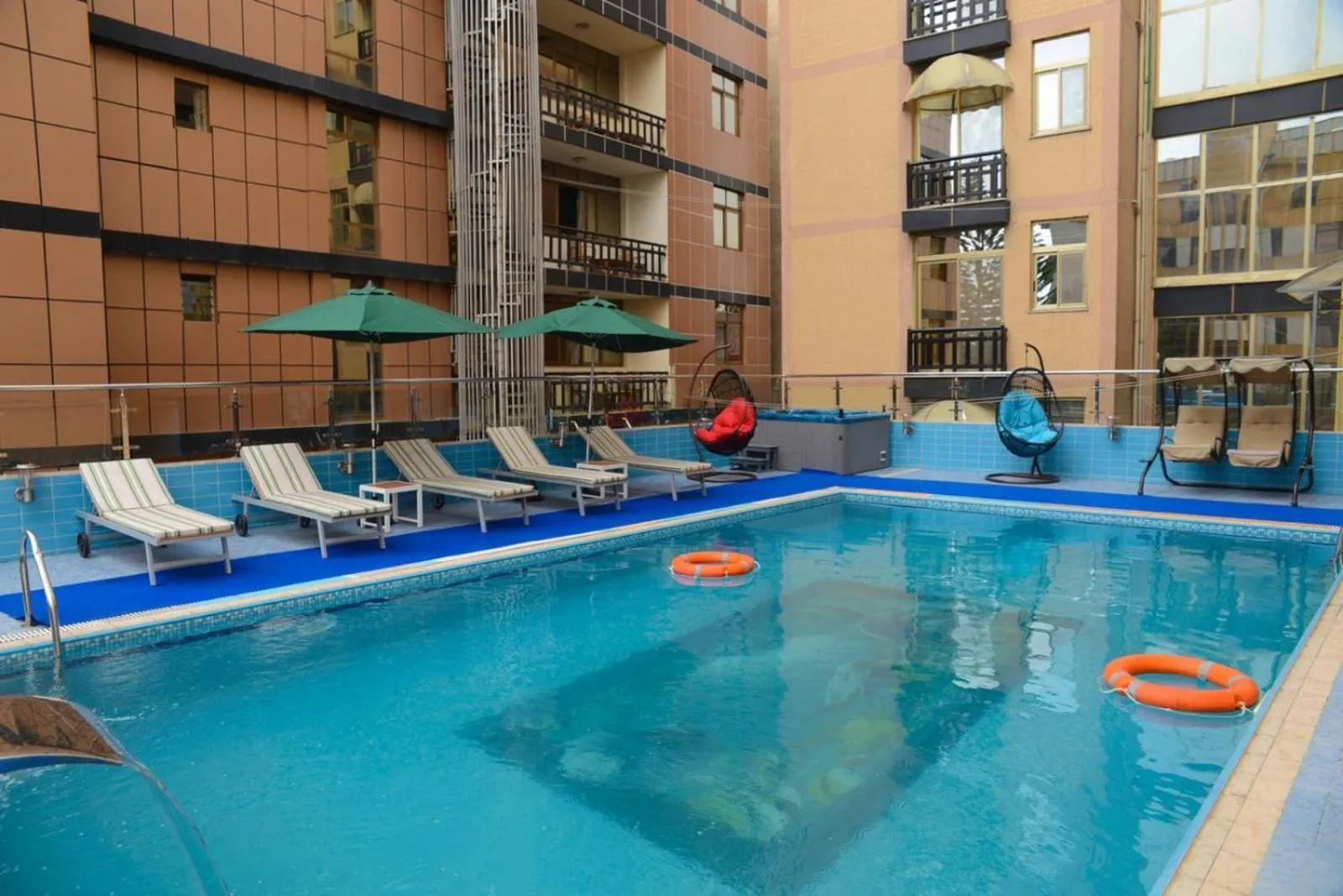 Property building in Emmad Furnished Hotel