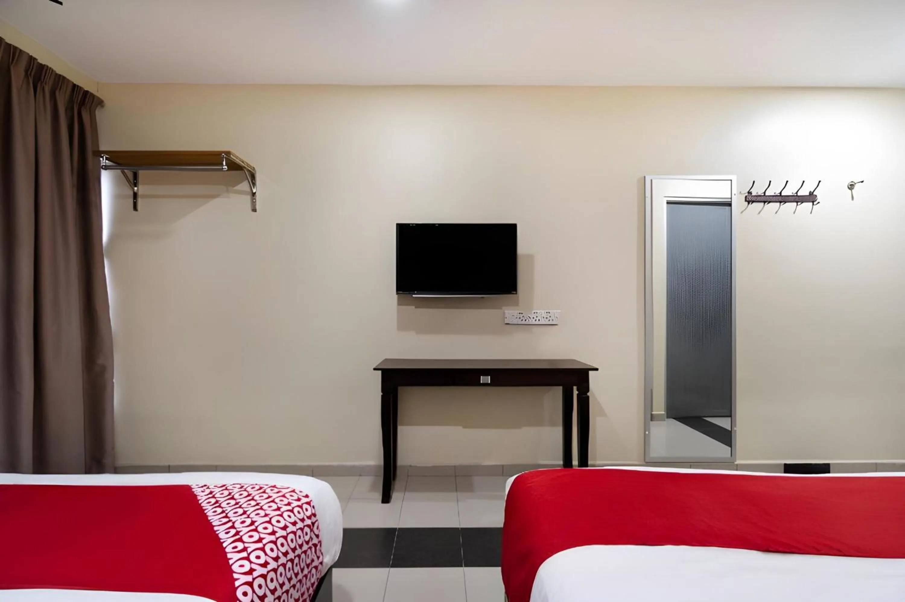 Photo of the whole room, Bed in OYO 89960 Manjung Inn Hotel