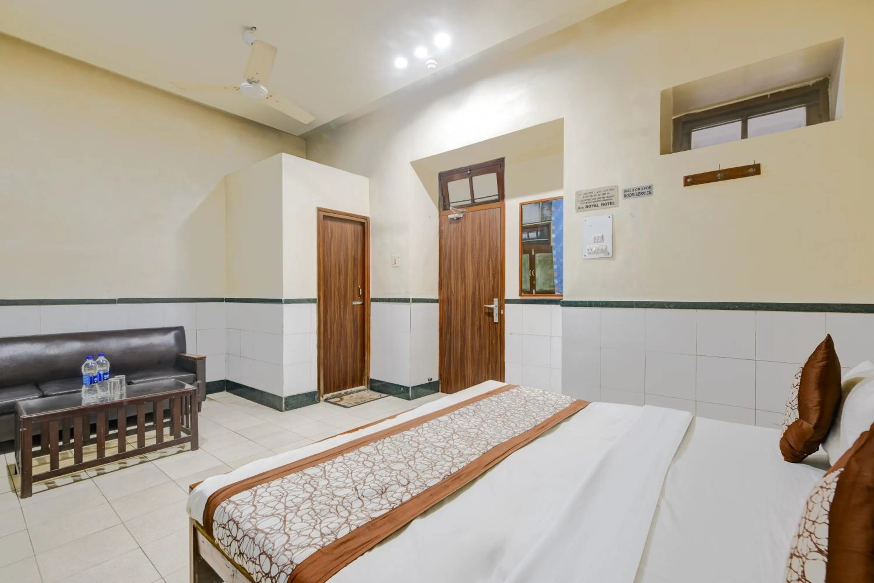 Photo of the whole room, Bed in New Royal Hotel Just Near Old Delhi Railway Station And Chandni Chowk