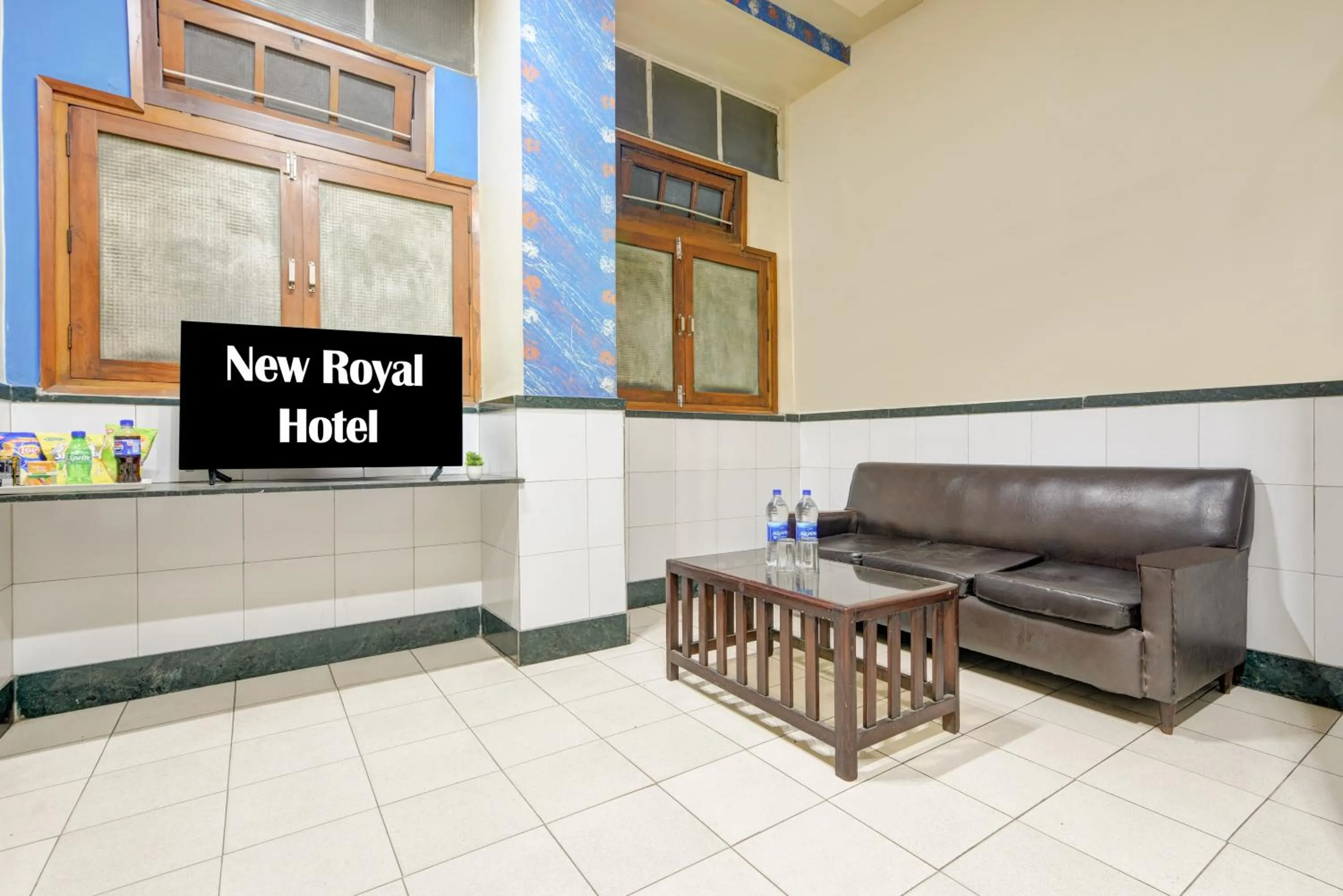 Text overlay in New Royal Hotel Just Near Old Delhi Railway Station And Chandni Chowk