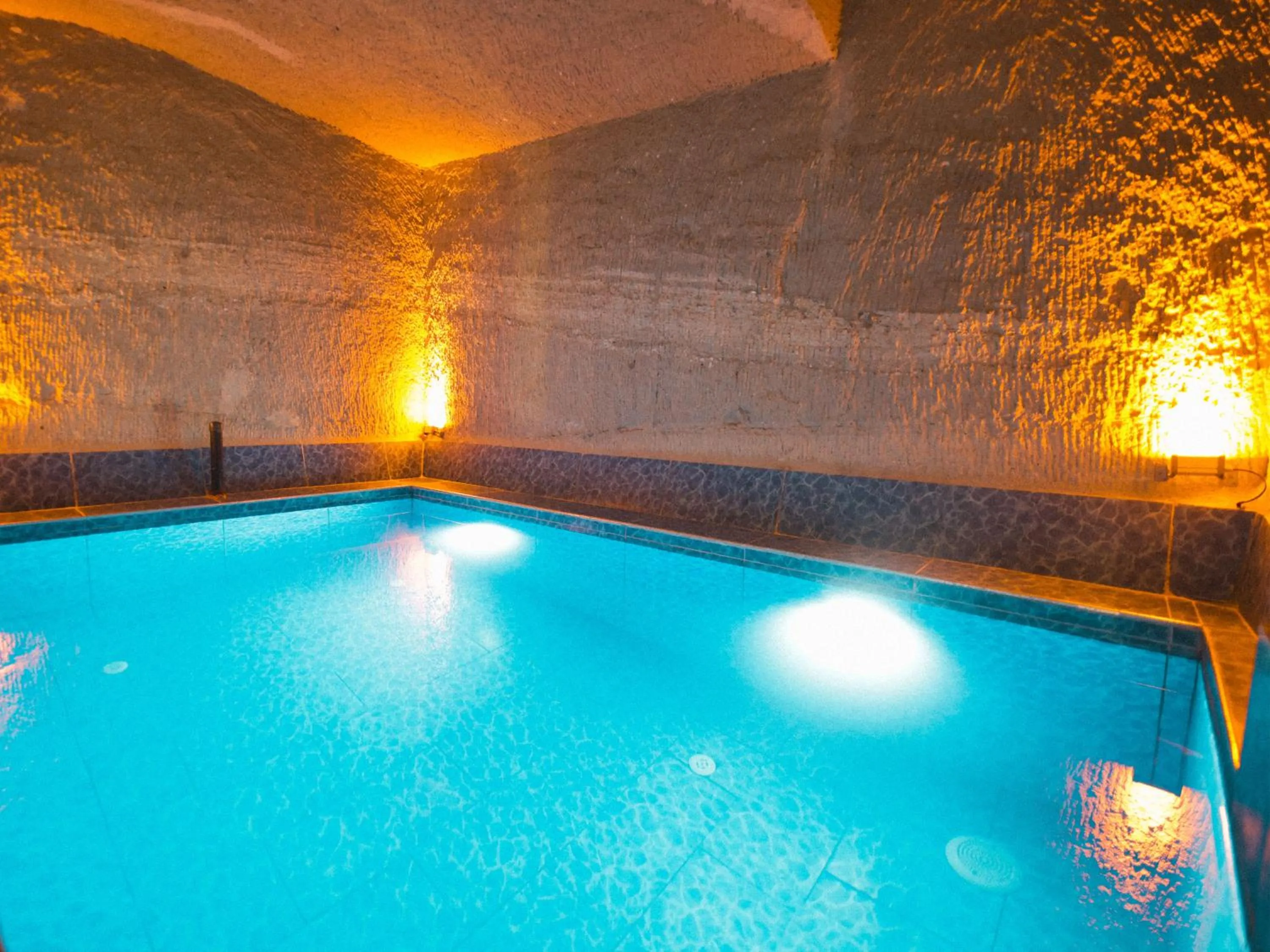 Swimming pool in My Cave Suites