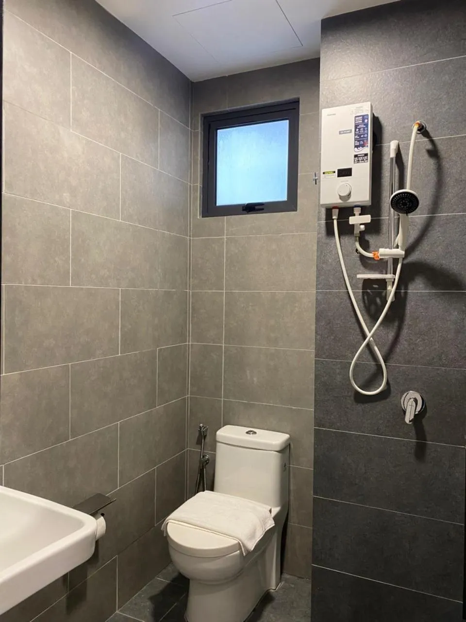 Shower in Neu Suites @ 3rdNvenue by Perfect Host