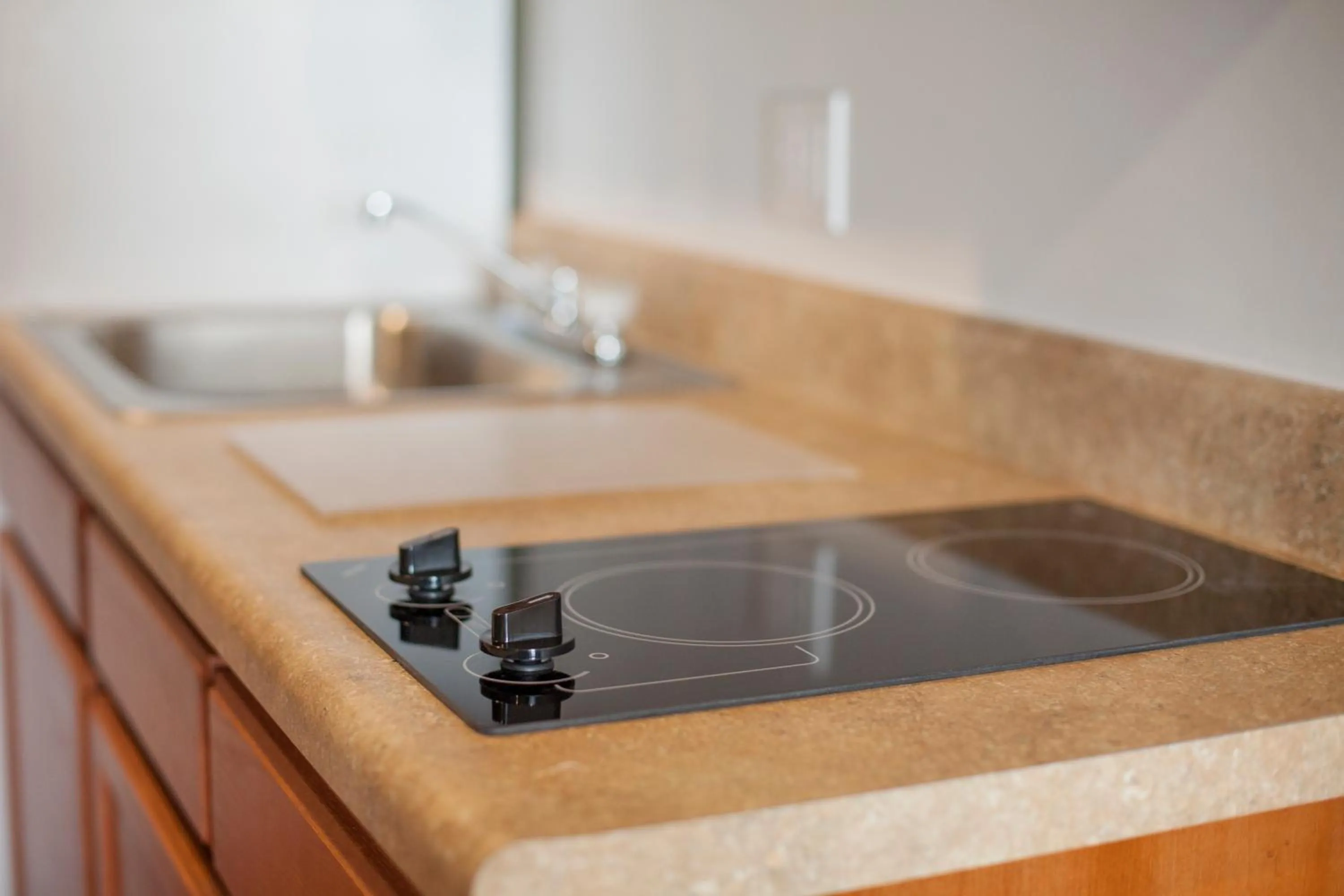 Kitchen or kitchenette in WoodSpring Suites Williston