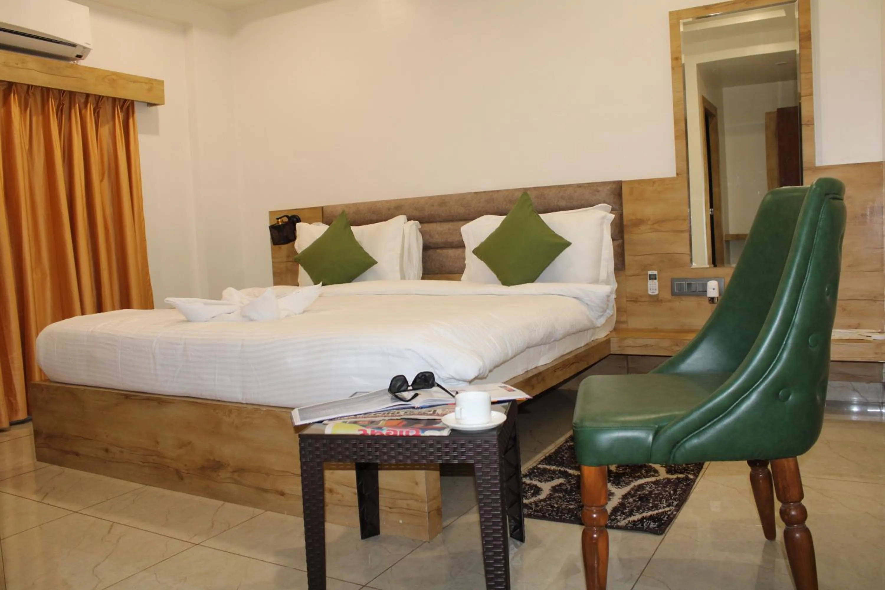 Seating area, Bed in Clarks Collection Somnath