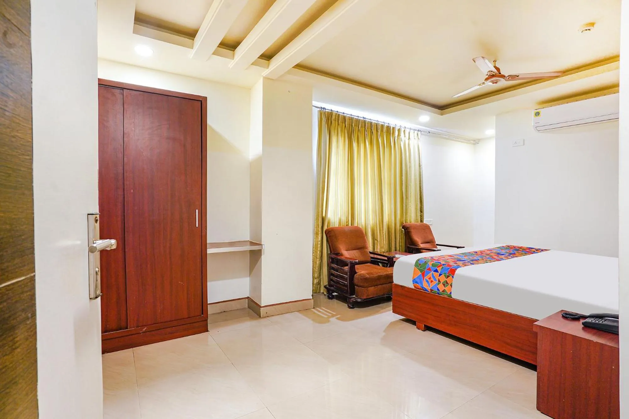 Bed in FabHotel Golden Way