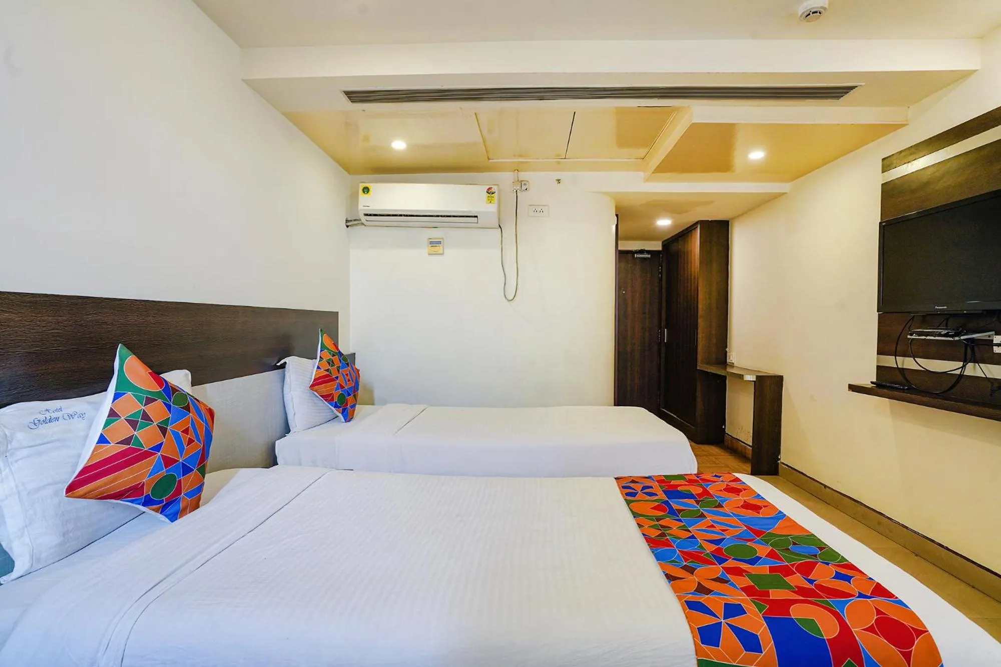 Bed in FabHotel Golden Way