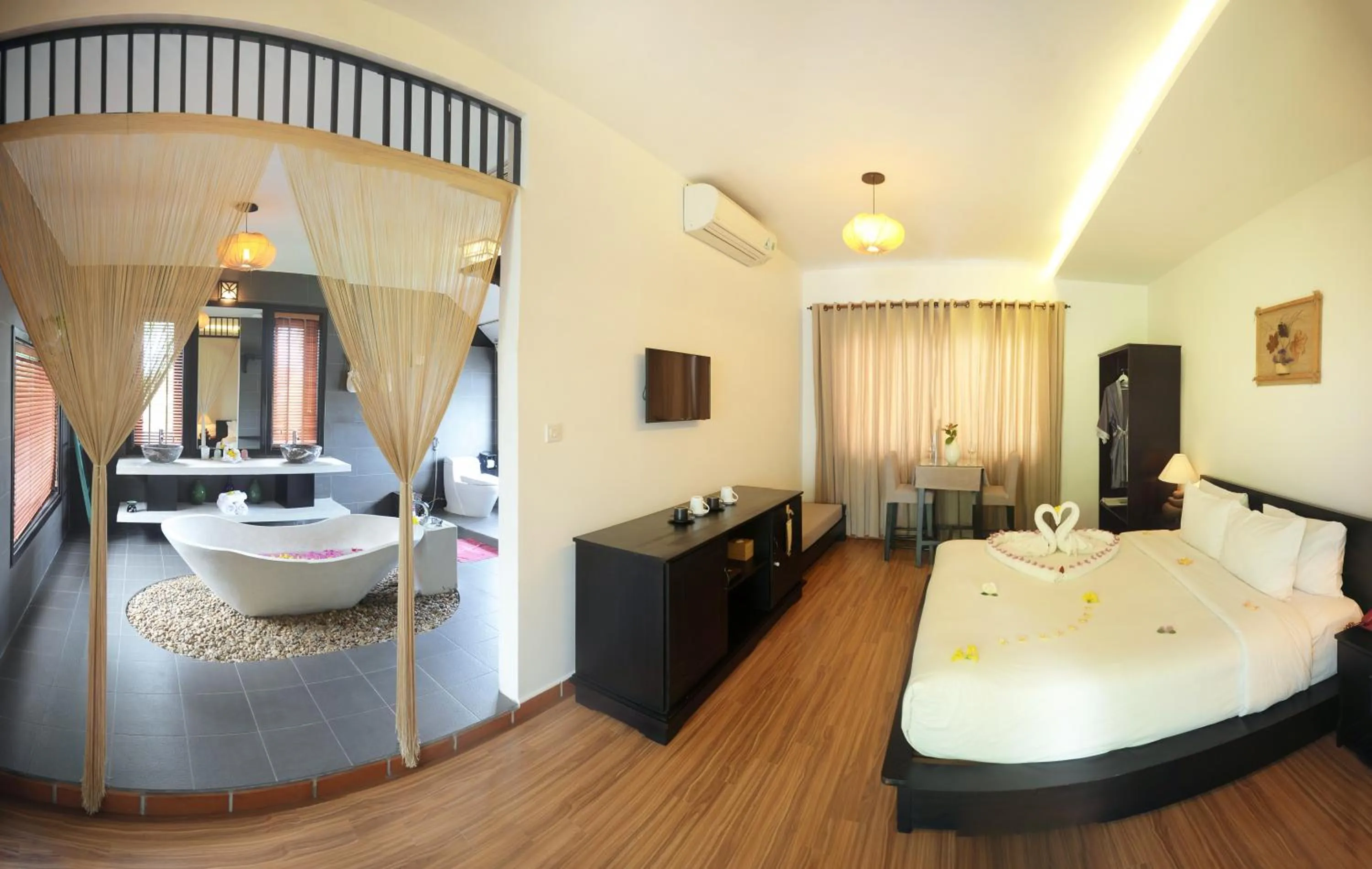 Photo of the whole room, Bed in East West Villa