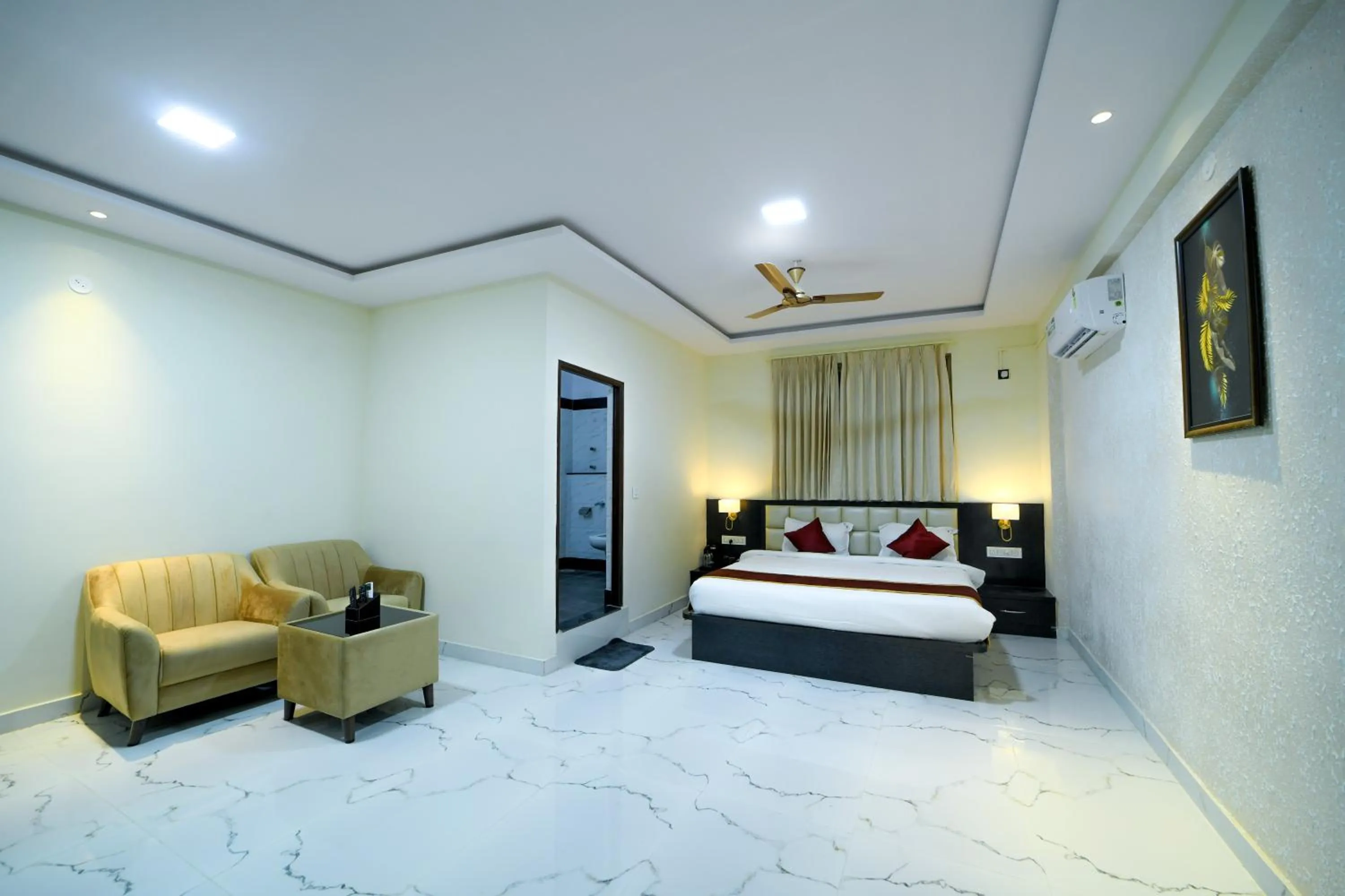 Bed in Hotel CN Windsor Chikmagaluru