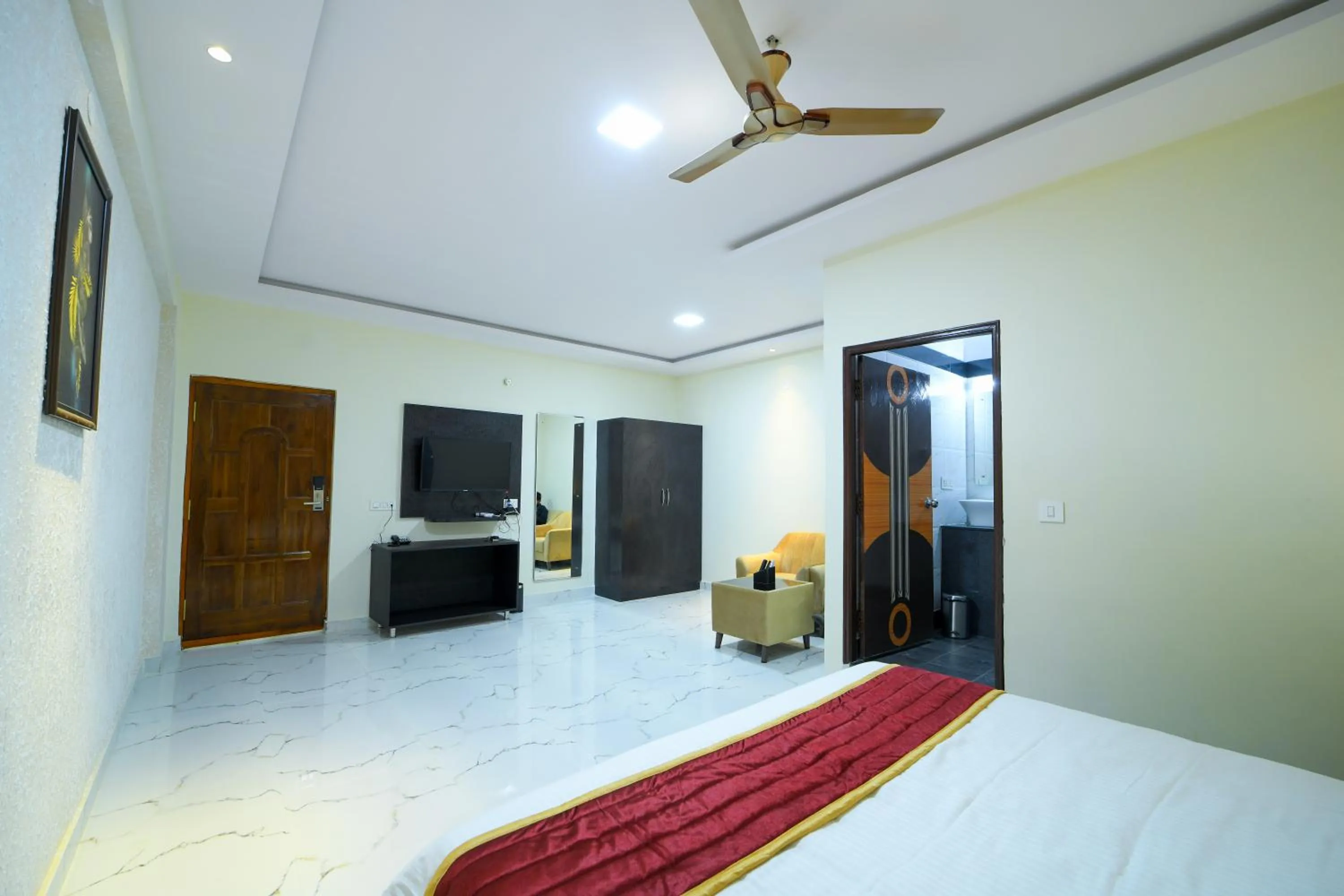 Bed in Hotel CN Windsor Chikmagaluru