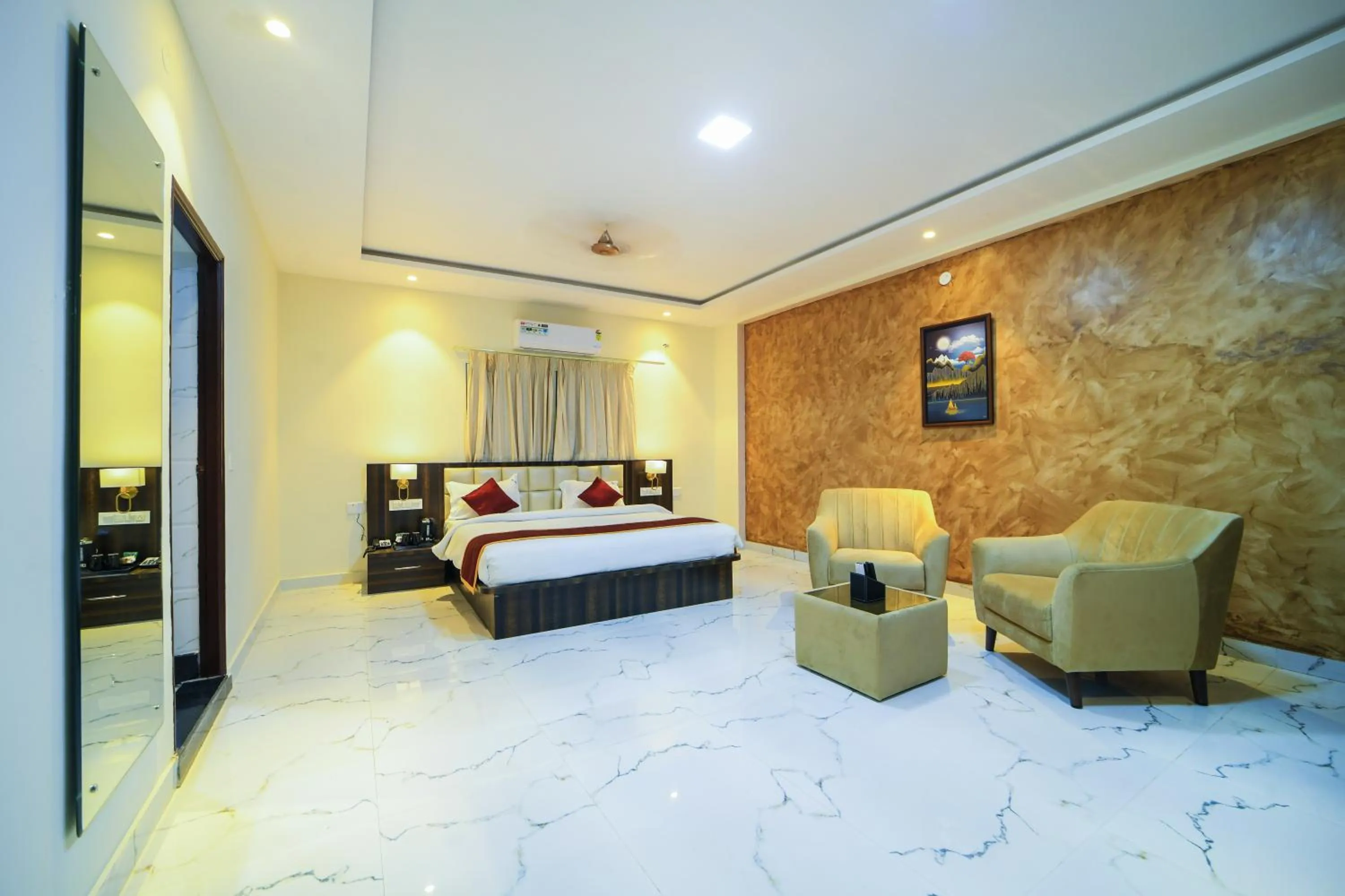 Bed in Hotel CN Windsor Chikmagaluru