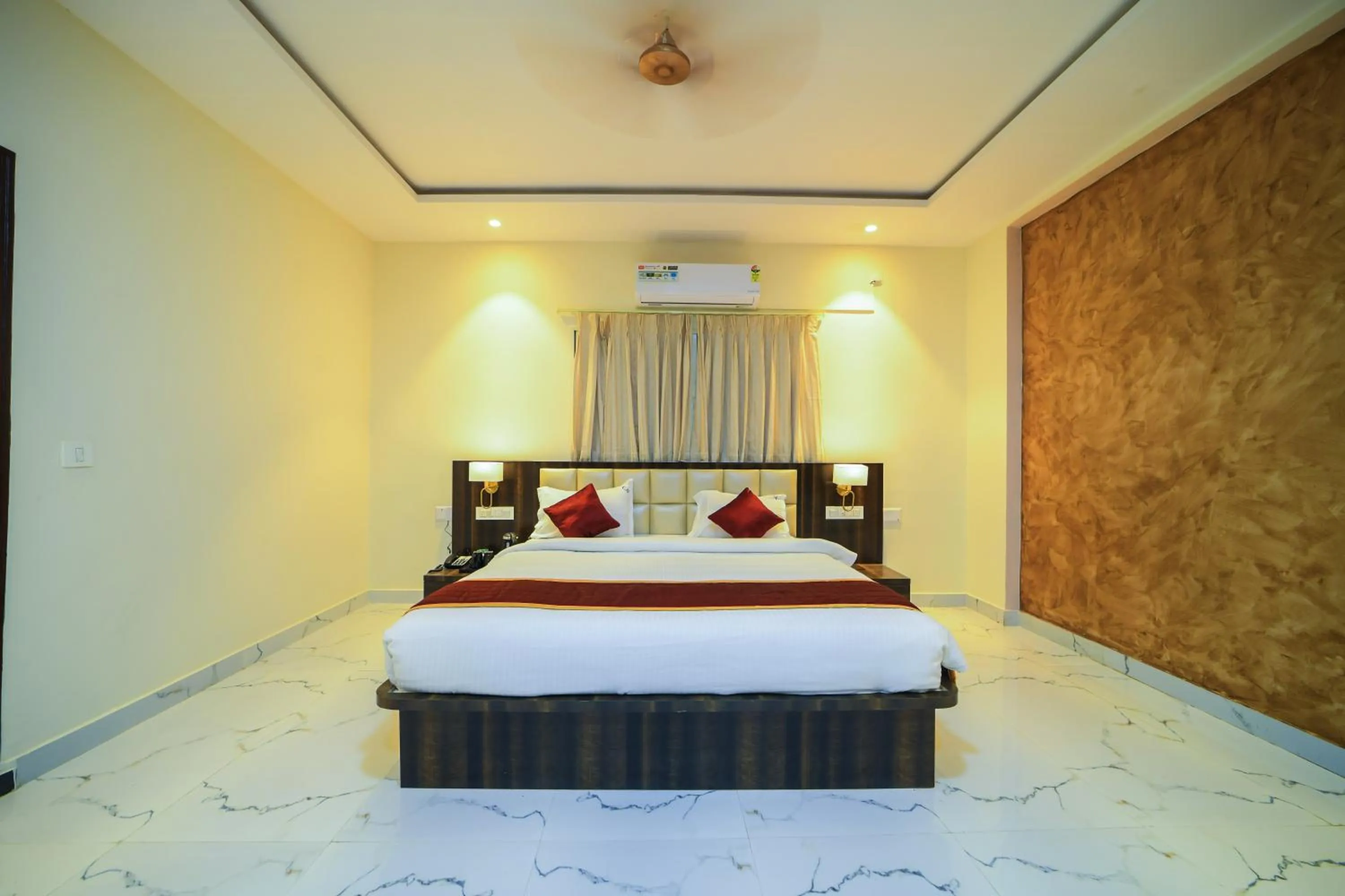 Bed in Hotel CN Windsor Chikmagaluru