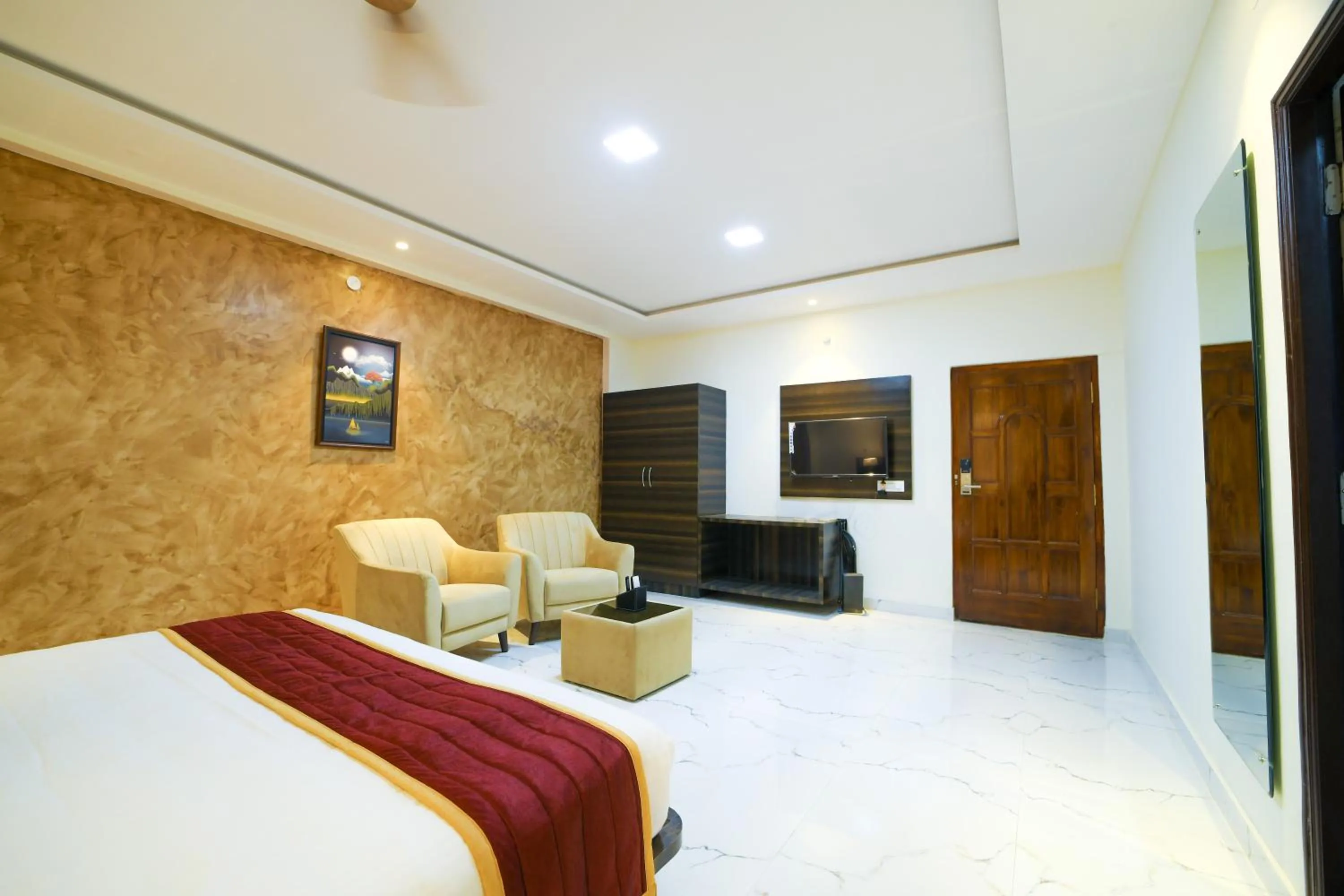 Bed in Hotel CN Windsor Chikmagaluru