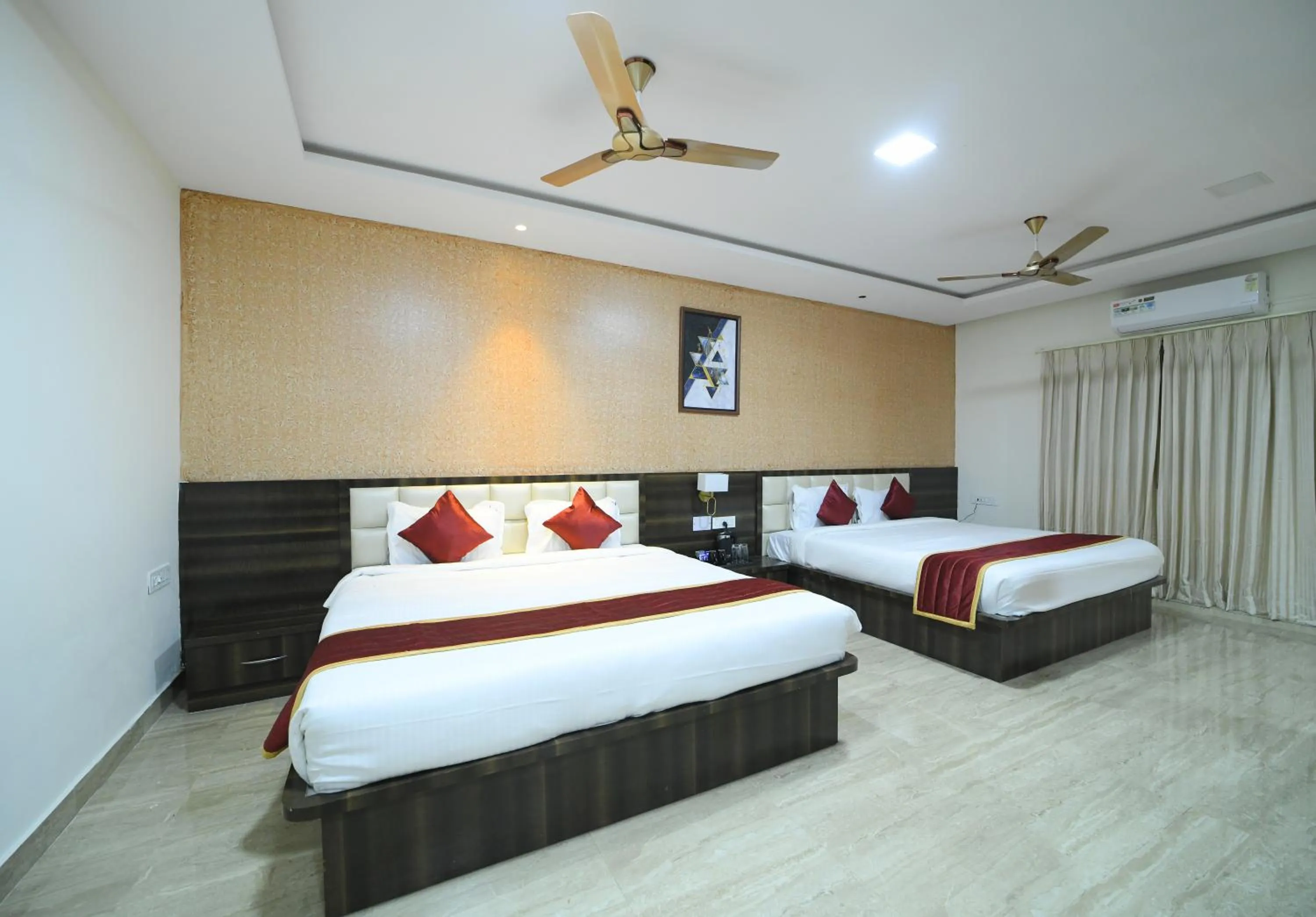 Bed in Hotel CN Windsor Chikmagaluru