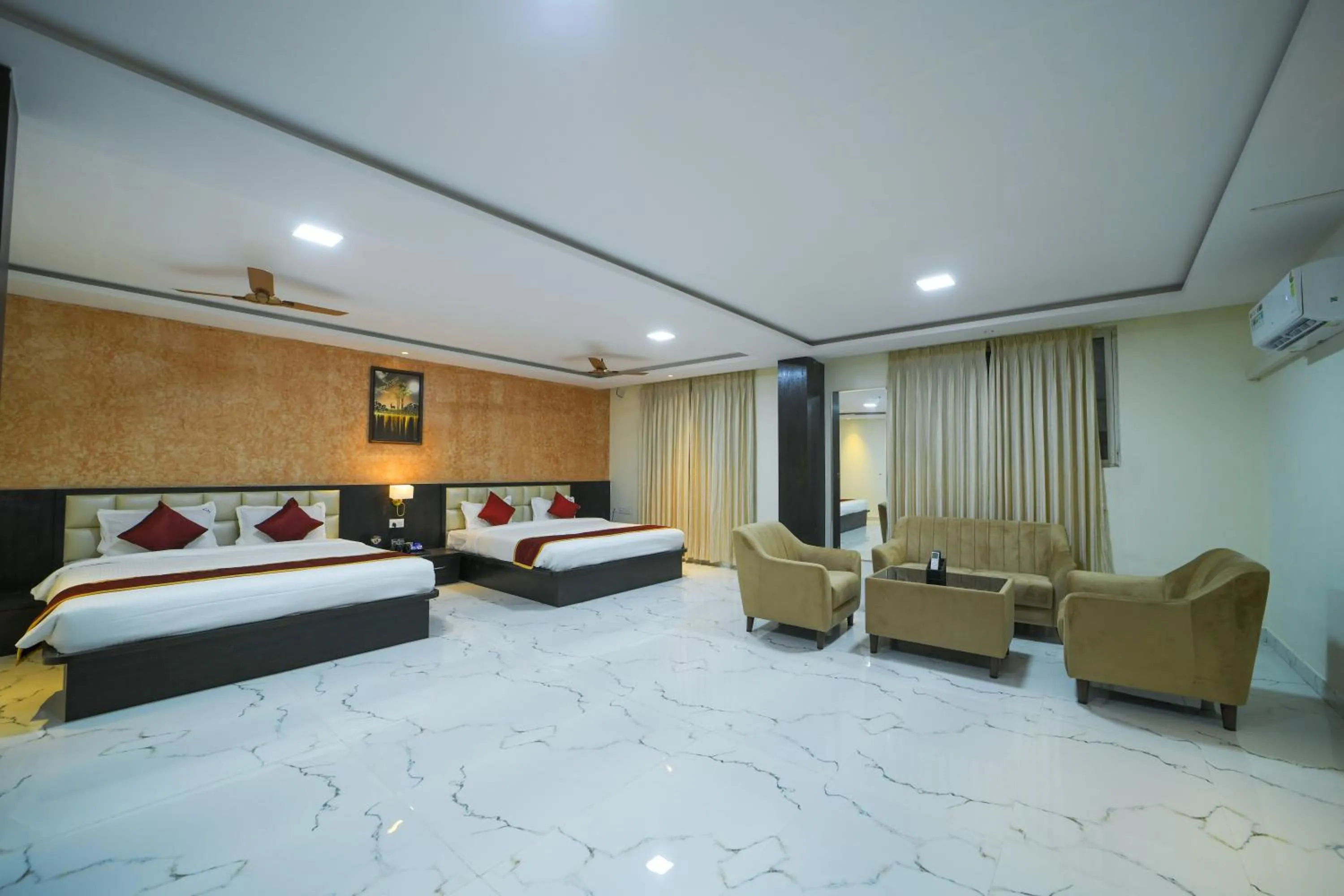 Bed in Hotel CN Windsor Chikmagaluru