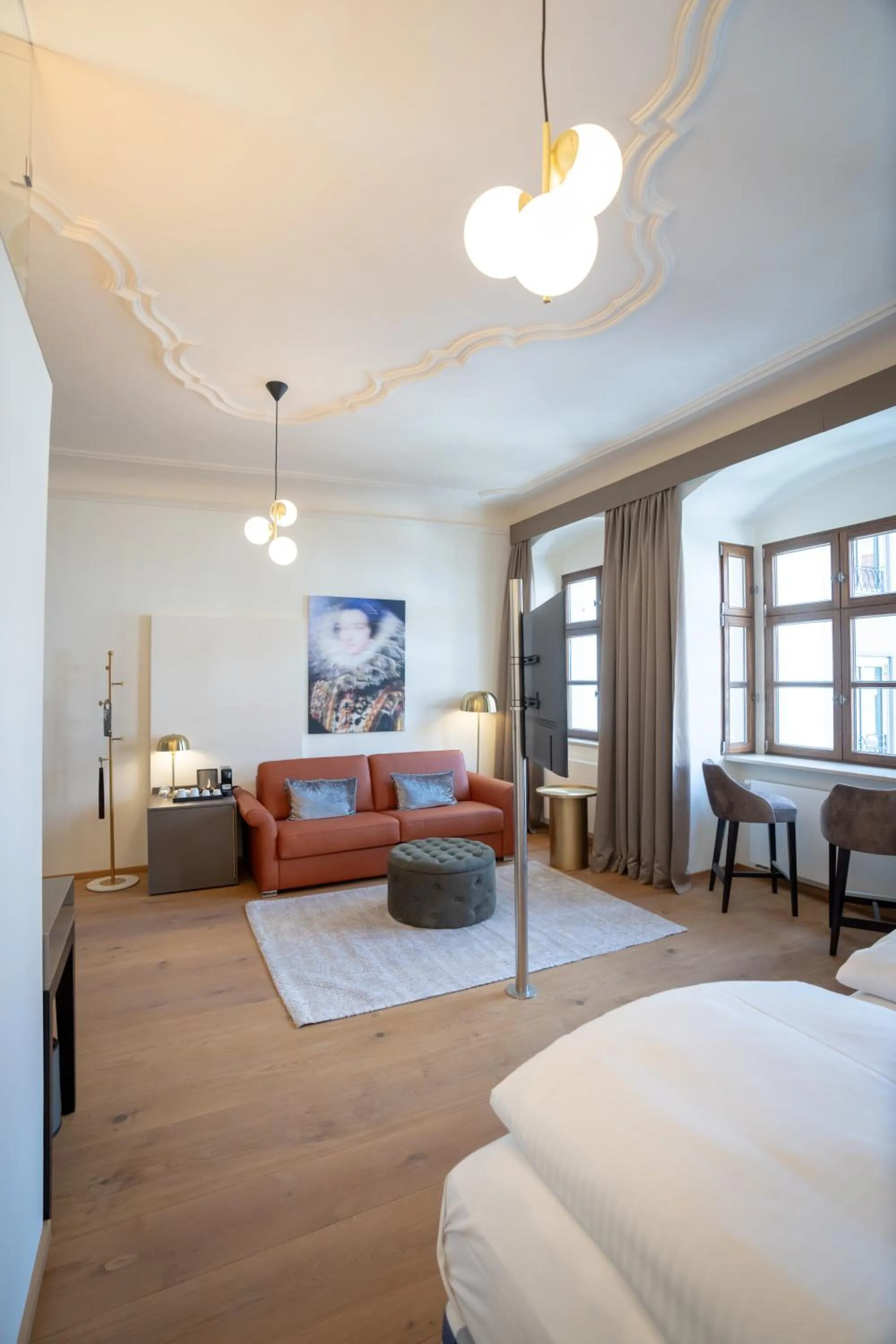 Photo of the whole room, Bed in Maxim Suites by Elias Holl