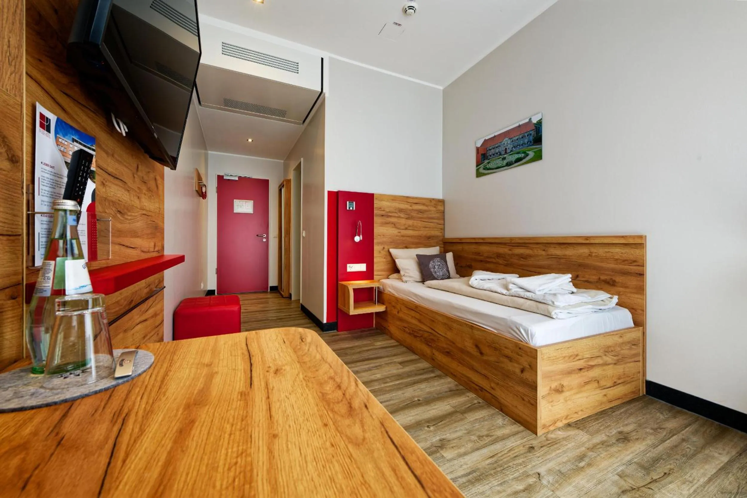 Photo of the whole room, Bed in INSIDE Nordhorn by Hackmann