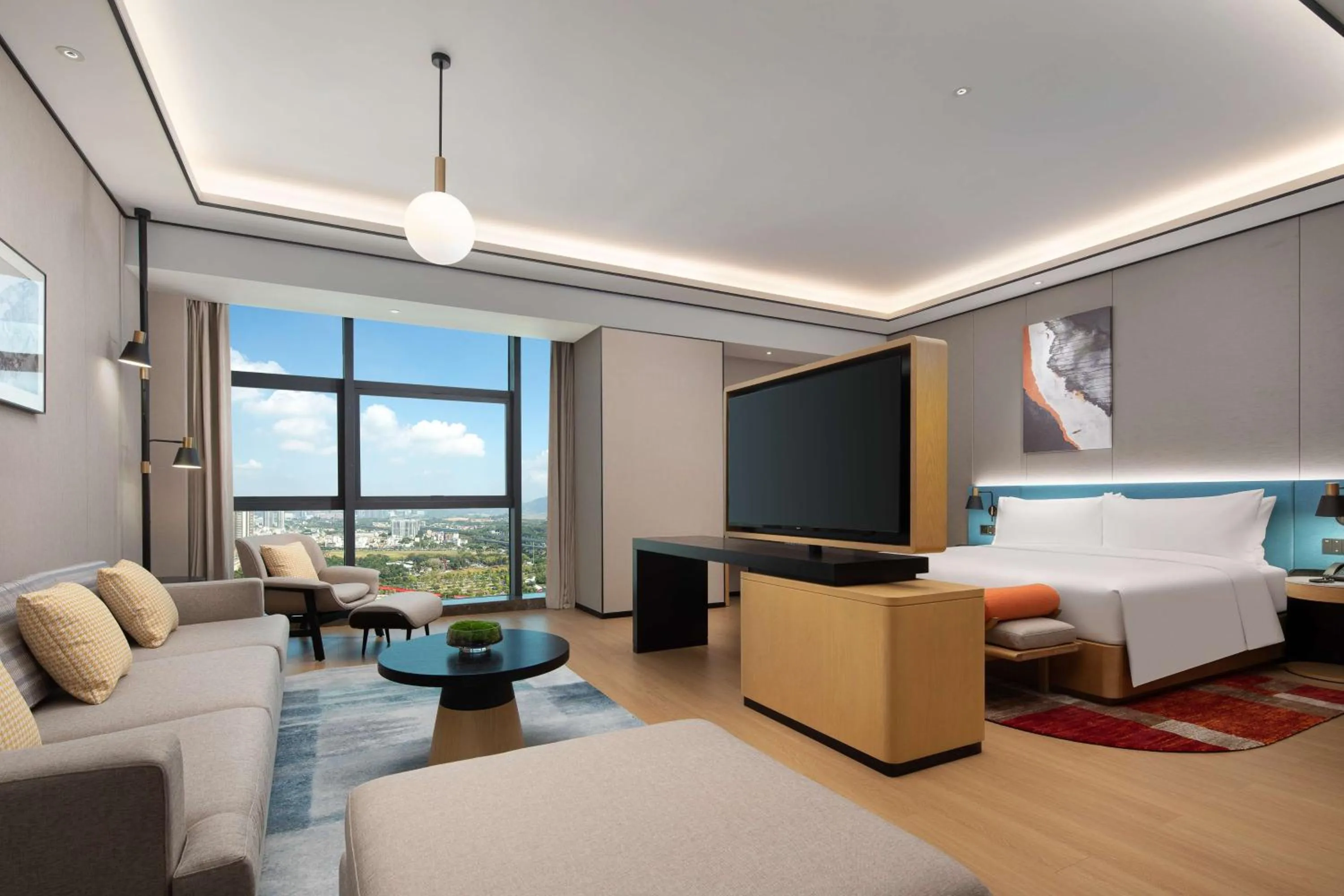 Living room, Bed in Hilton Garden Inn Shenzhen Guangming Hongqiao Park
