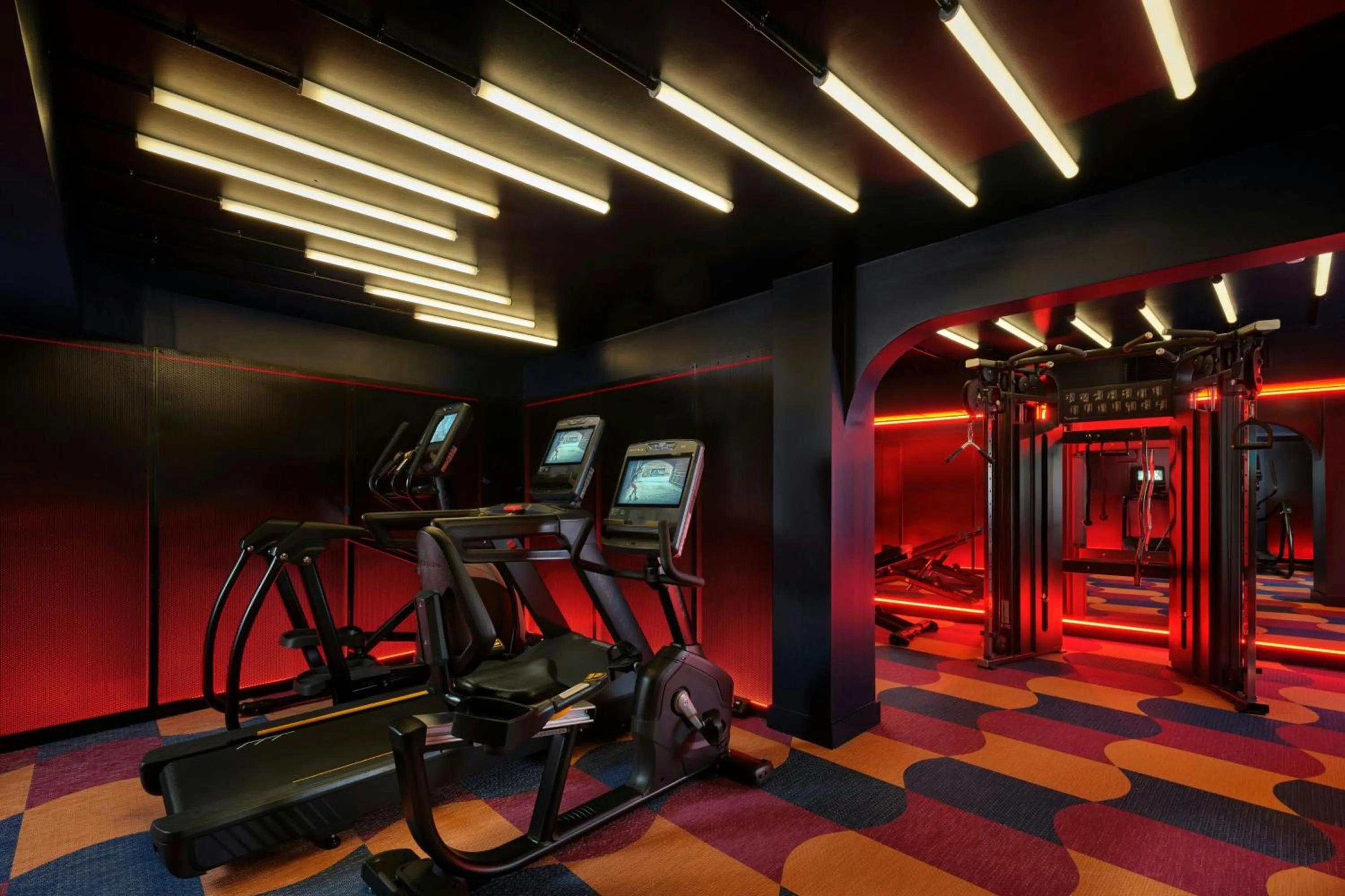 Fitness centre/facilities in The Cura Hotel Kensington, London, a Tribute Portfolio Hotel