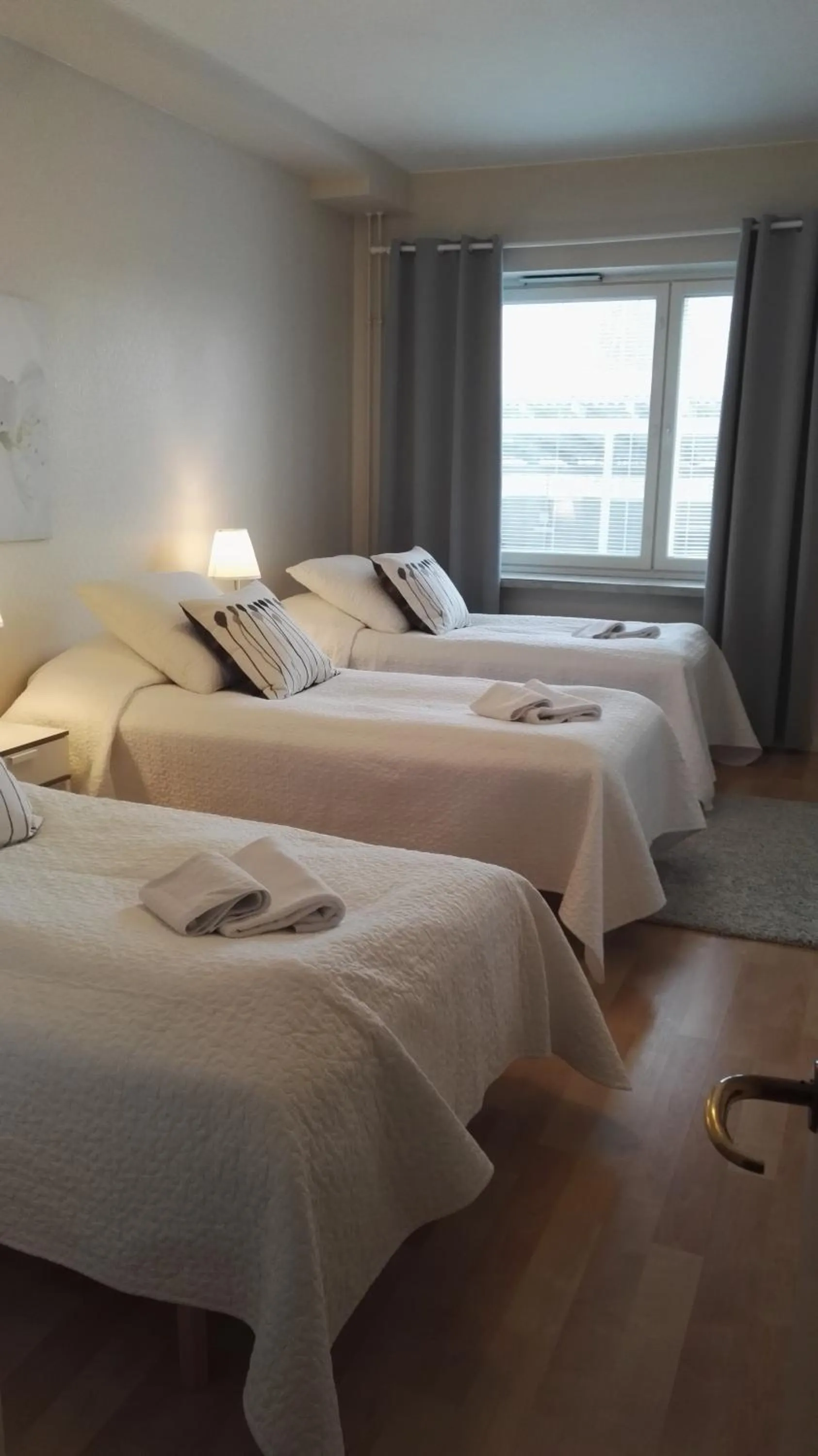 Bed in Kotimaailma Apartments Rovaniemi