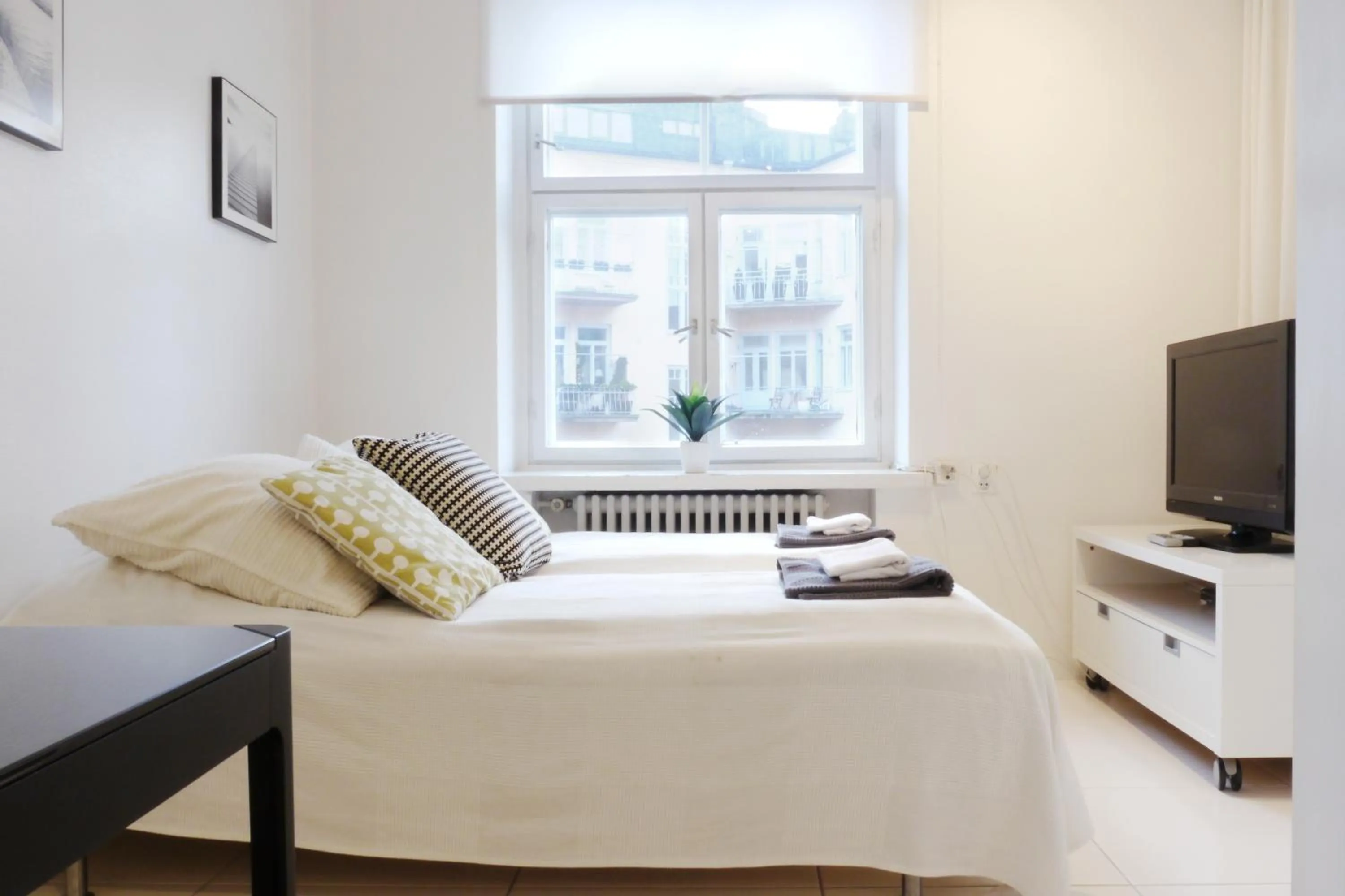 Bed in Kotimaailma Apartments Rovaniemi