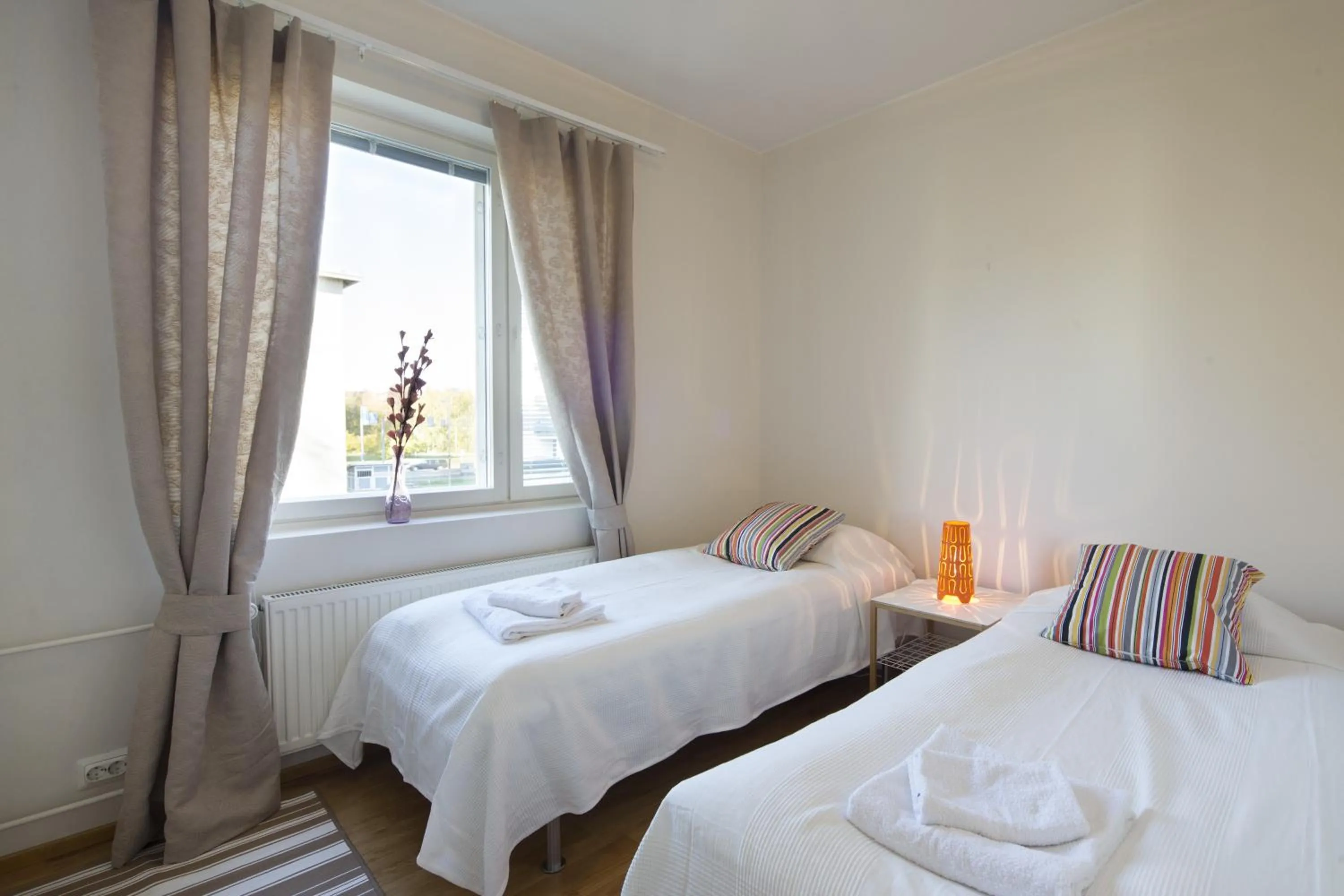 Day, Bed in Kotimaailma Apartments Rovaniemi