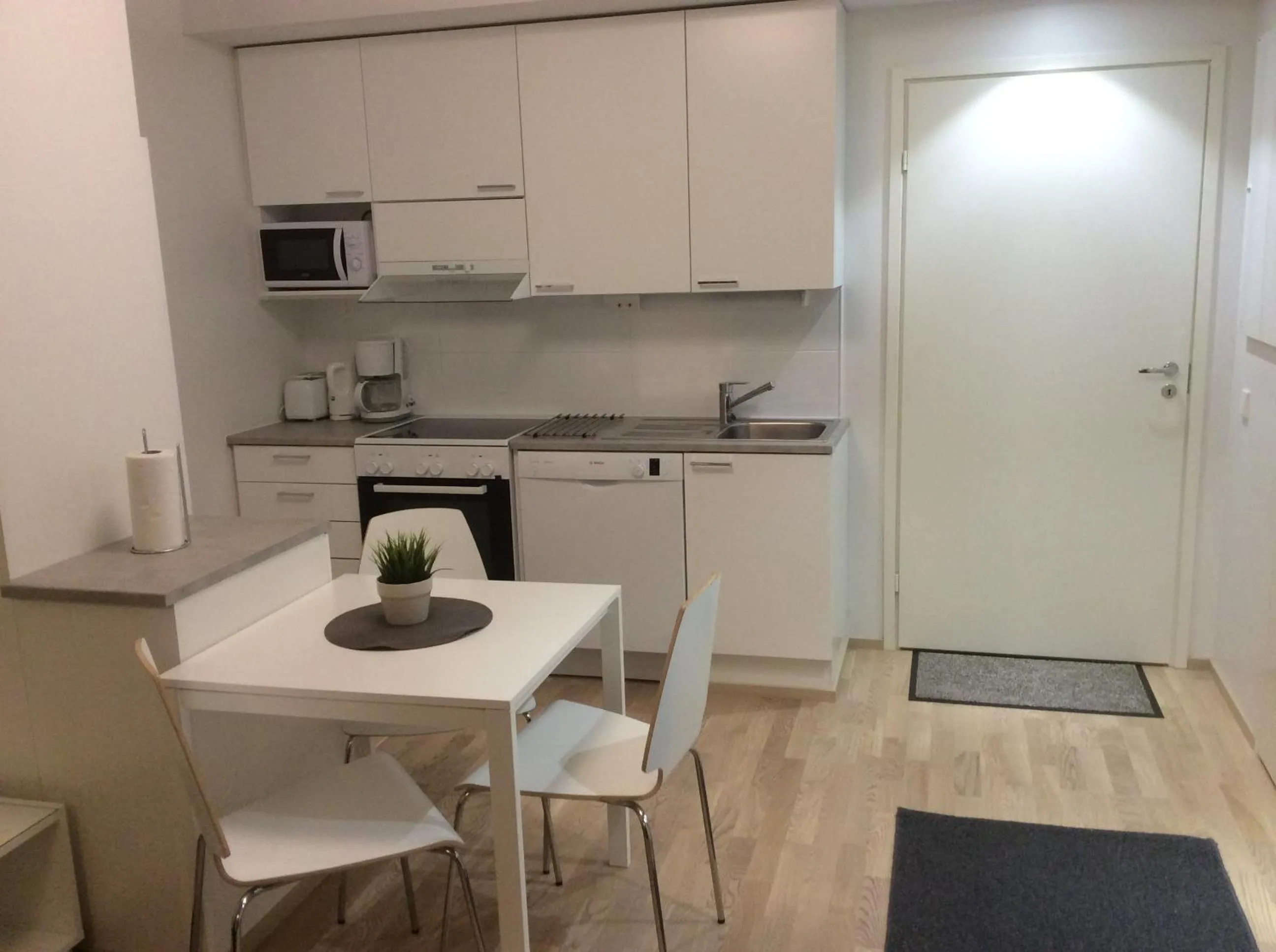 Kitchen or kitchenette in Kotimaailma Apartments Rovaniemi
