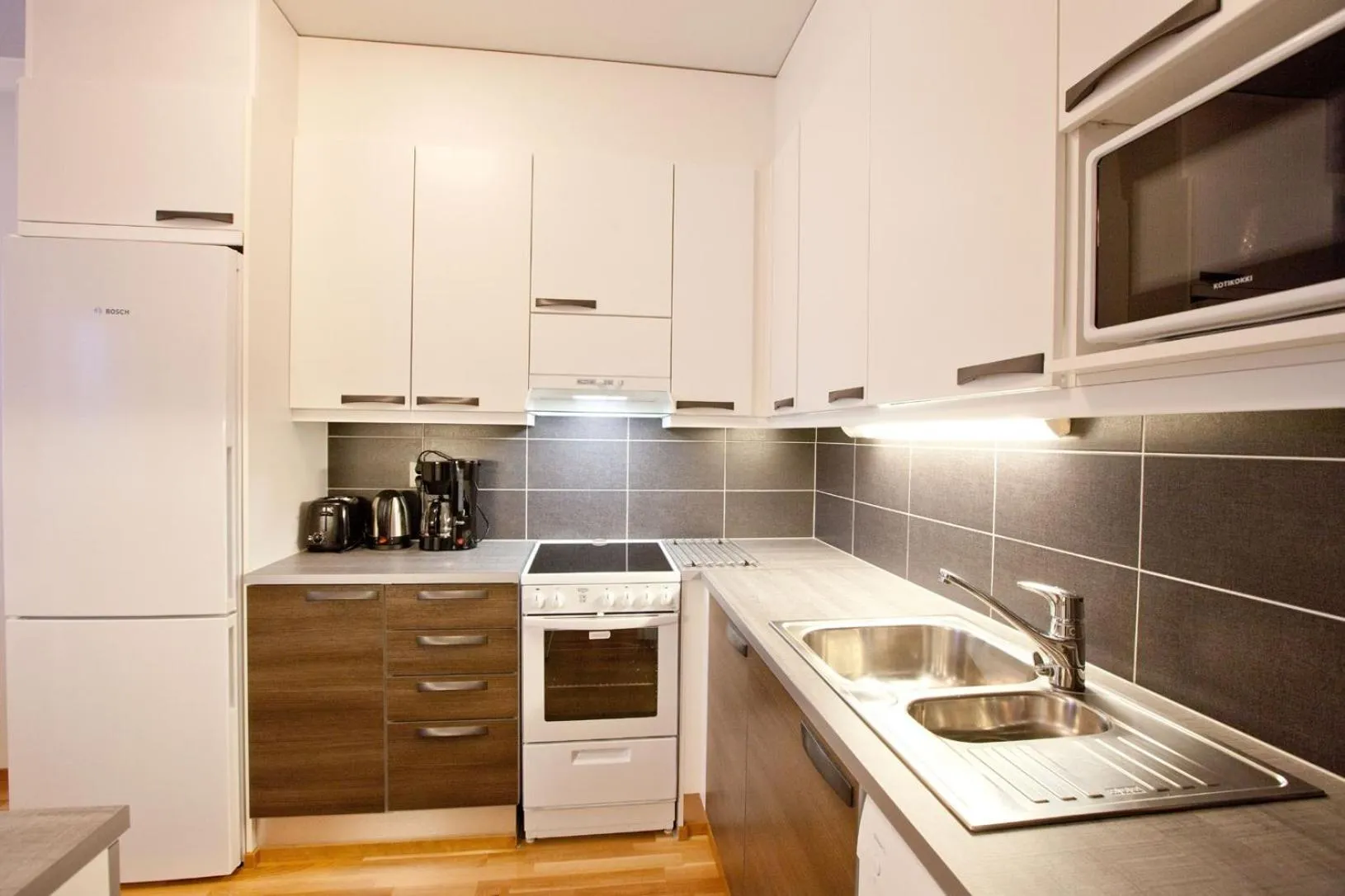 Kitchen or kitchenette in Kotimaailma Apartments Rovaniemi
