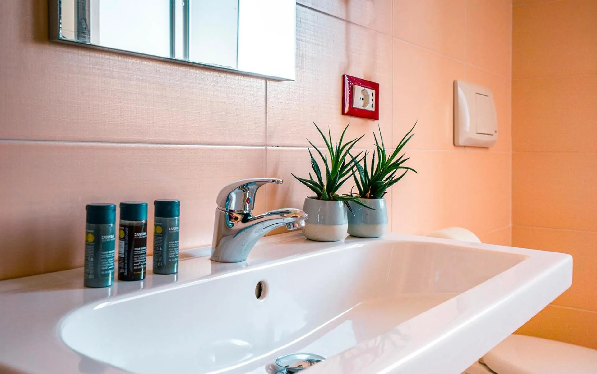 Bathroom in Hotel Formula Int. & Puravita SPA