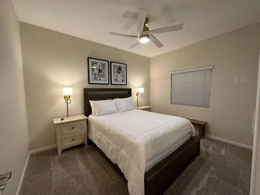 Bed in Mesquite Retreat 2 Bd Condo by Cool Properties LLC